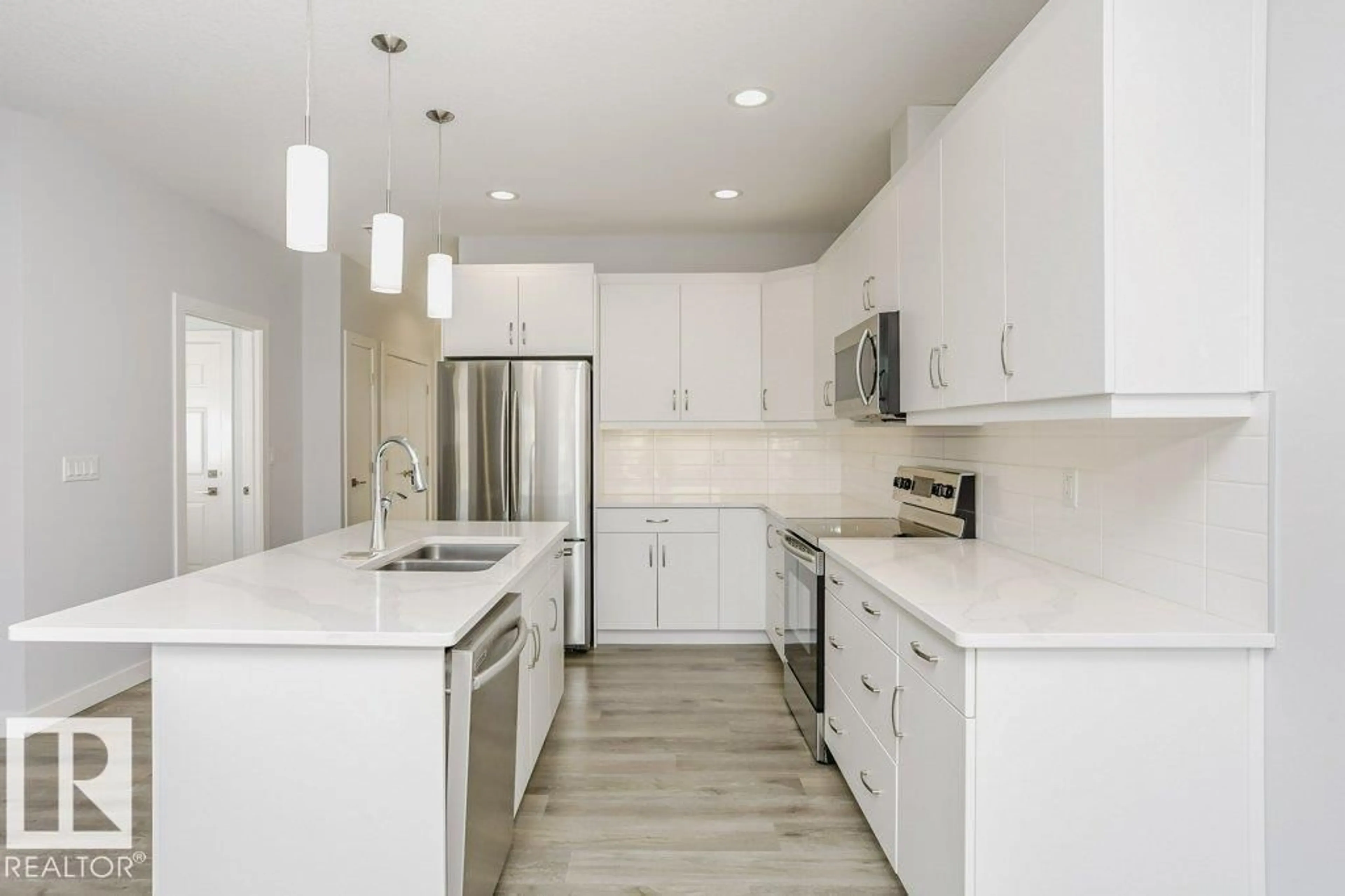 Open concept kitchen, unknown for #33 - 4517 190A ST, Edmonton Alberta T6M0R4