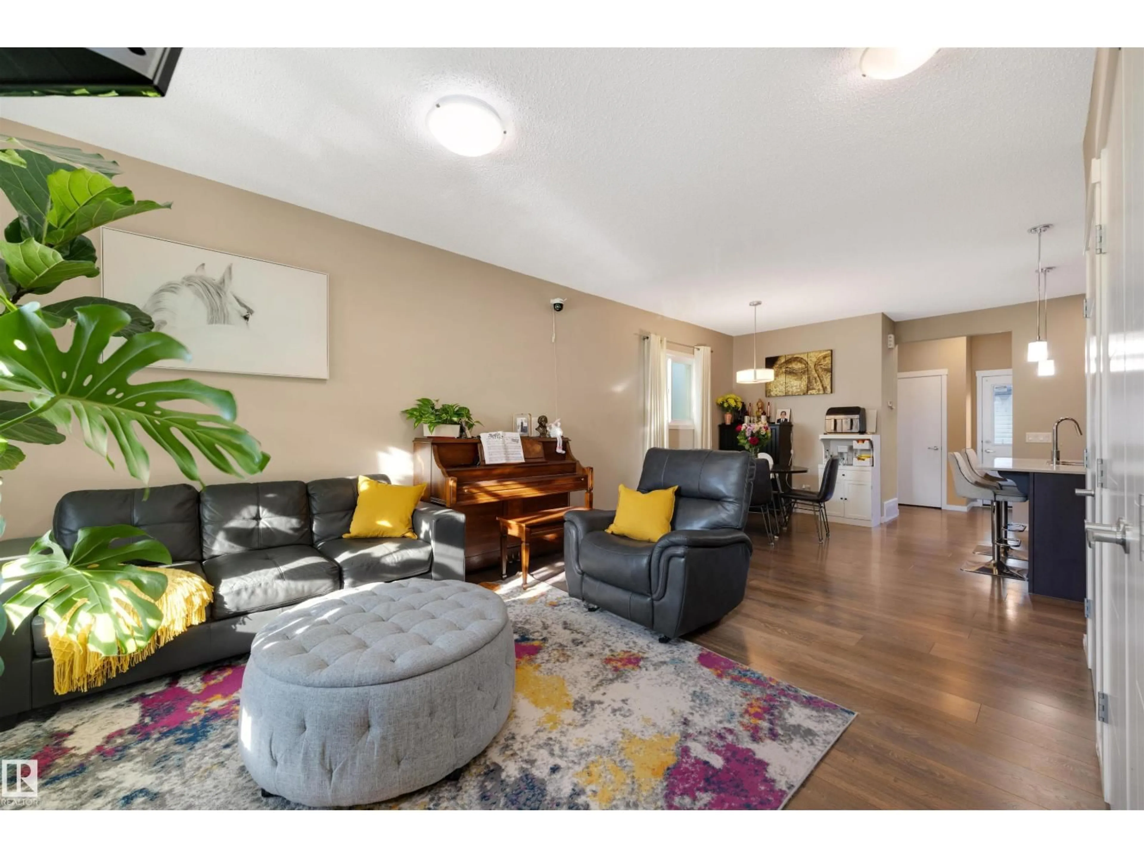 Living room with furniture, unknown for 1426 26 AV, Edmonton Alberta T6T0W1