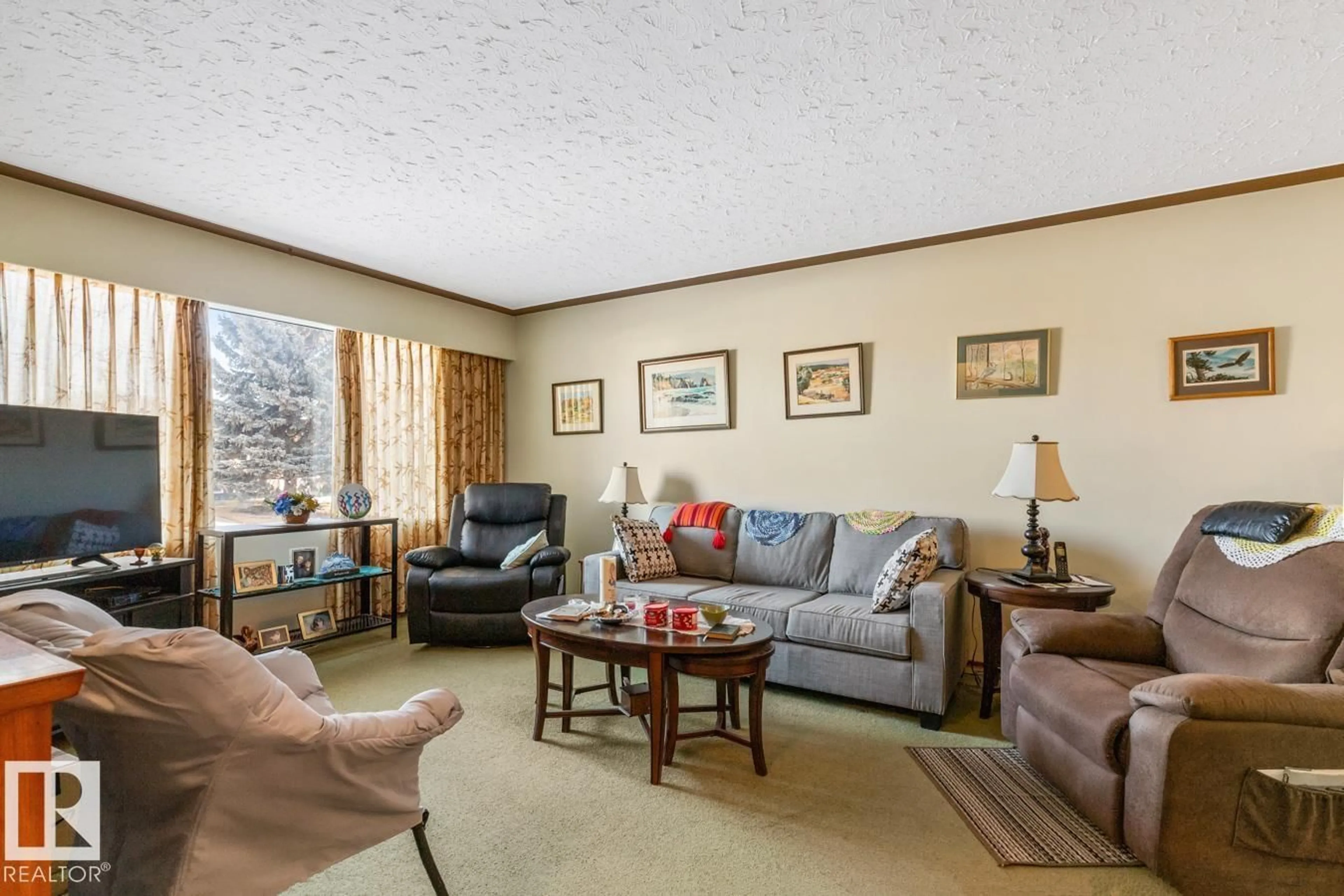 Living room with furniture, unknown for 7319 86 AV, Edmonton Alberta T6B0K6