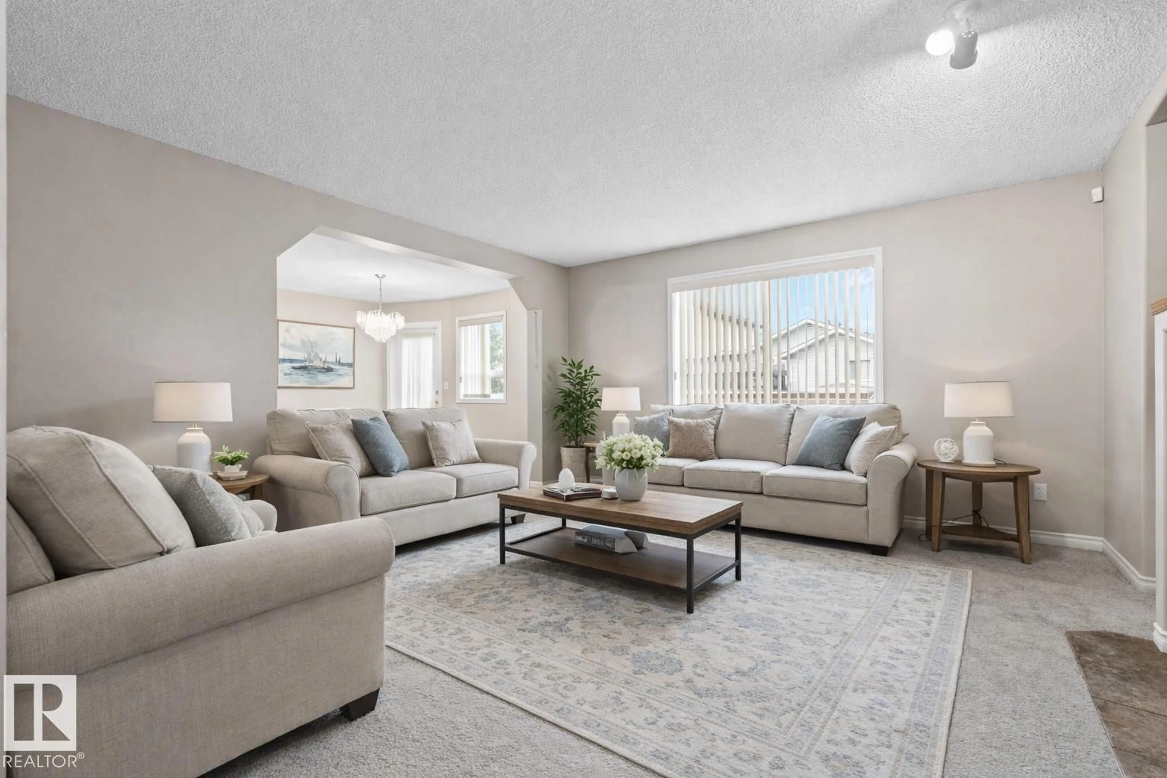 Living room with furniture, unknown for 4804 147 AV, Edmonton Alberta T5Y2X2