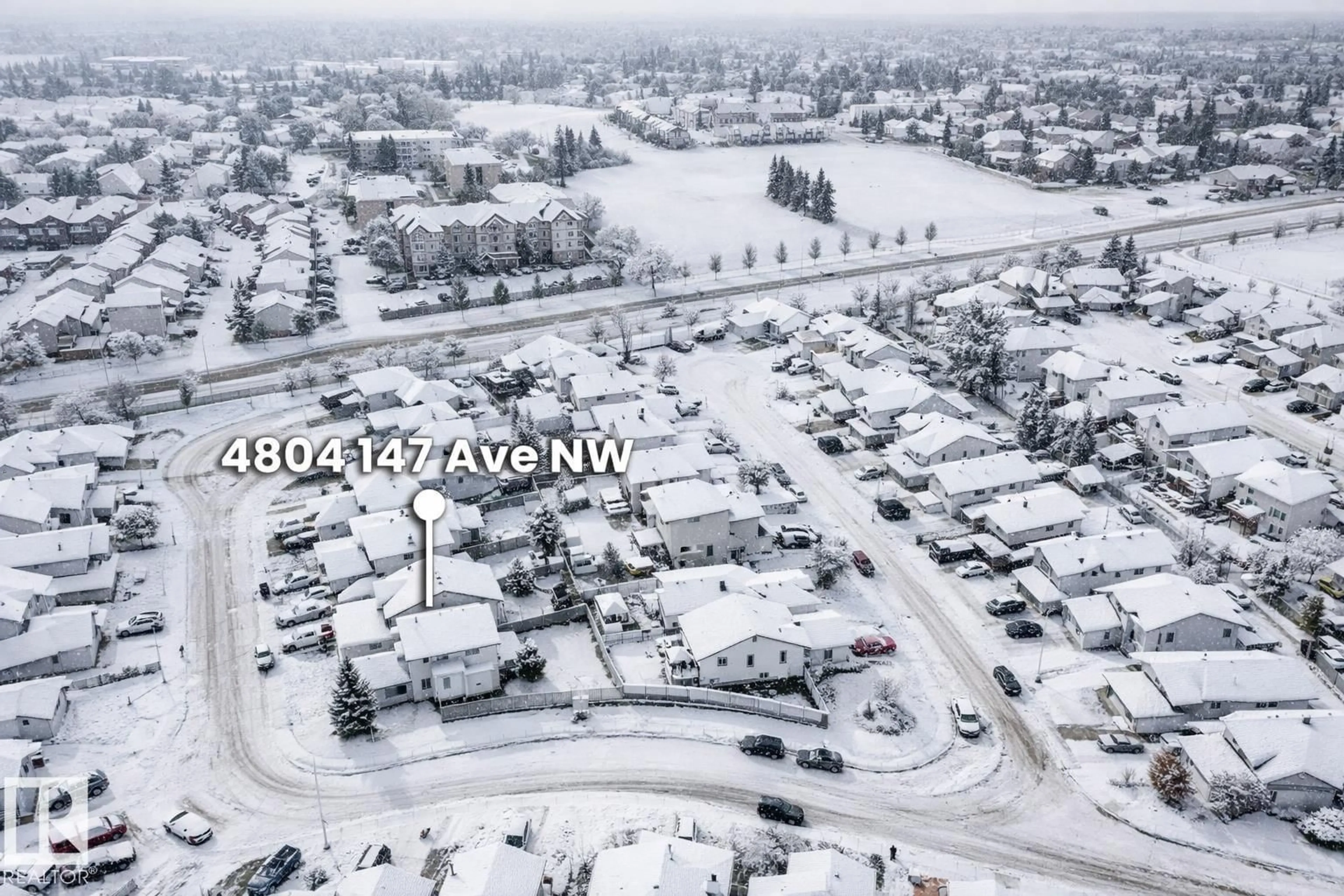 A pic from outside/outdoor area/front of a property/back of a property/a pic from drone, street for 4804 147 AV, Edmonton Alberta T5Y2X2