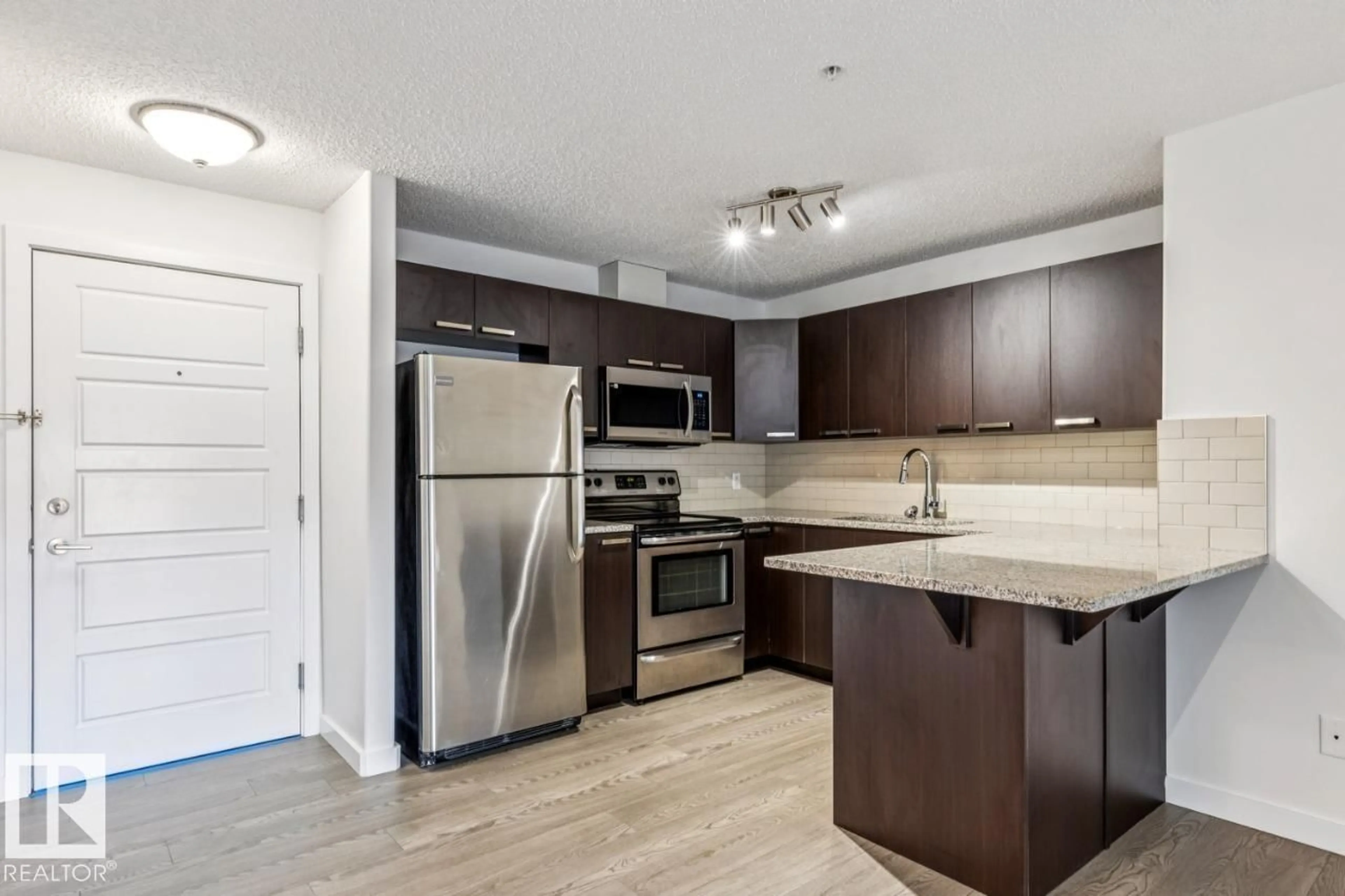 Standard kitchen, wood/laminate floor for #223 - 14808 125 ST, Edmonton Alberta T5X0G1