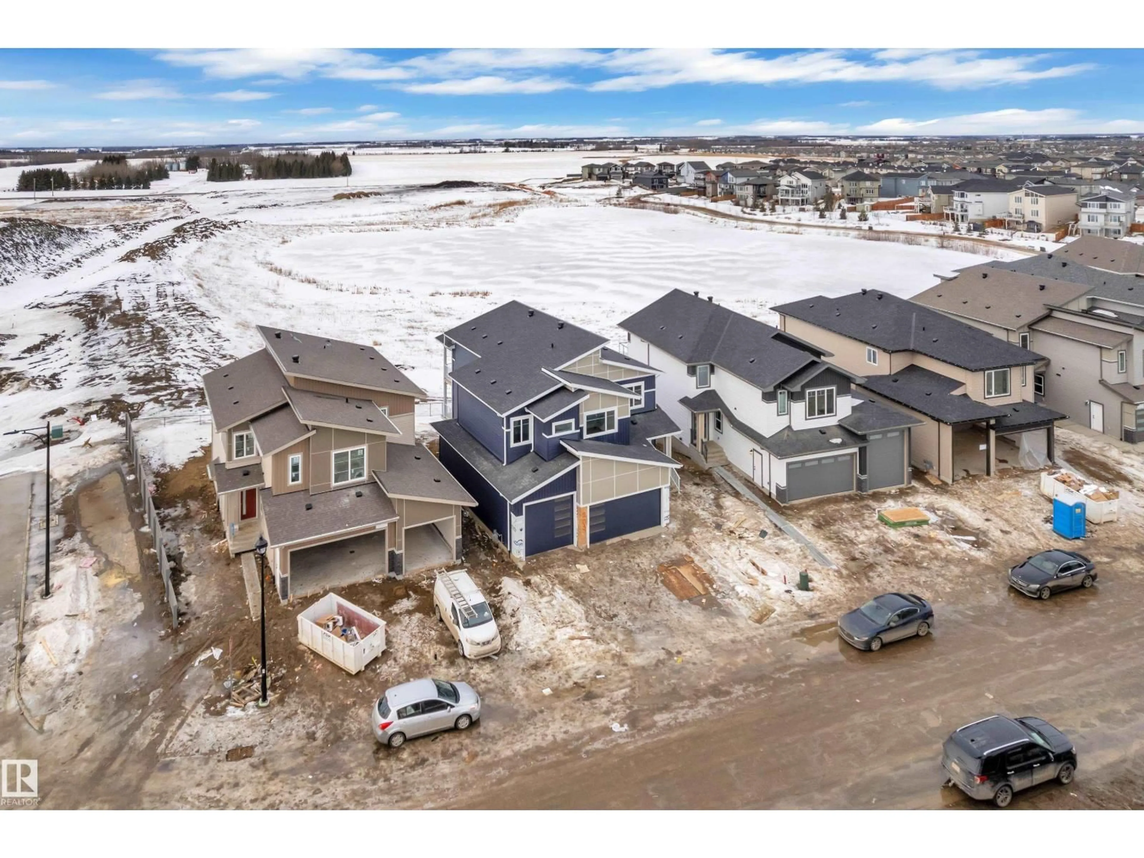 A pic from outside/outdoor area/front of a property/back of a property/a pic from drone, unknown for 202 BASIN CO, Leduc Alberta T9E1T6