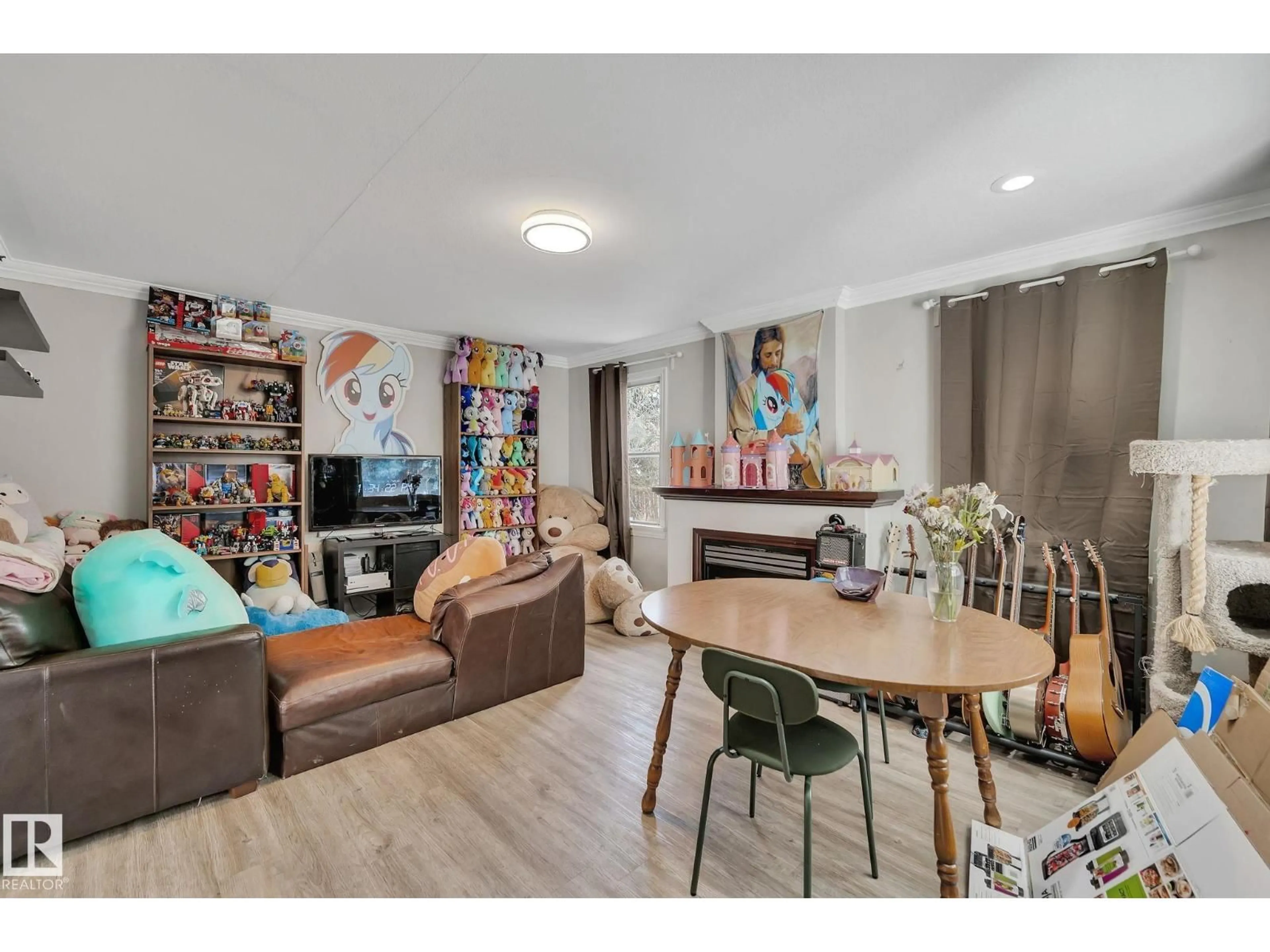 Living room with furniture, unknown for NW - 12235 104 ST, Edmonton Alberta T5G2L7