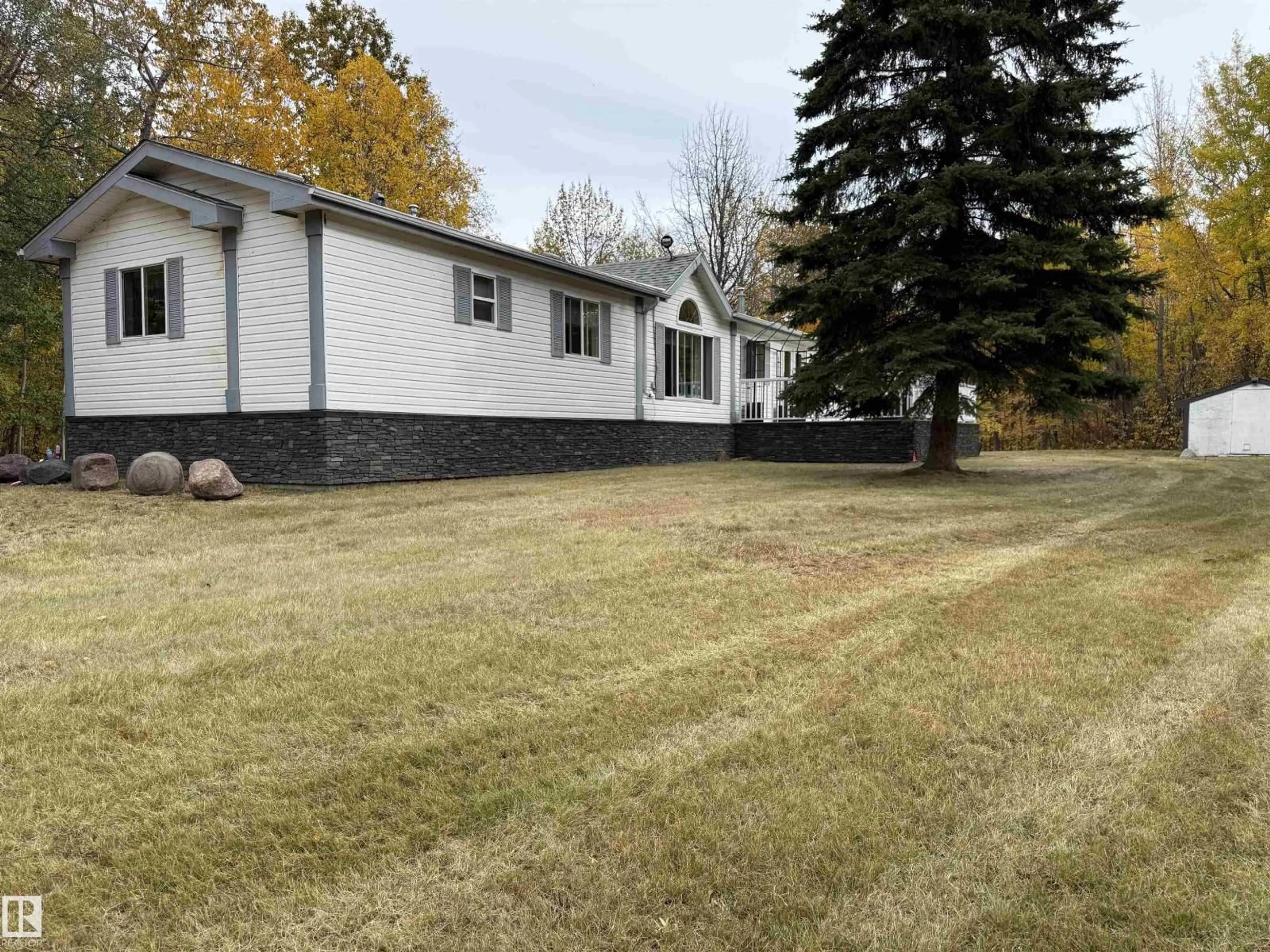 A pic from outside/outdoor area/front of a property/back of a property/a pic from drone, unknown for 90 47424 RGE RD 20, Rural Leduc County Alberta T0C2P0