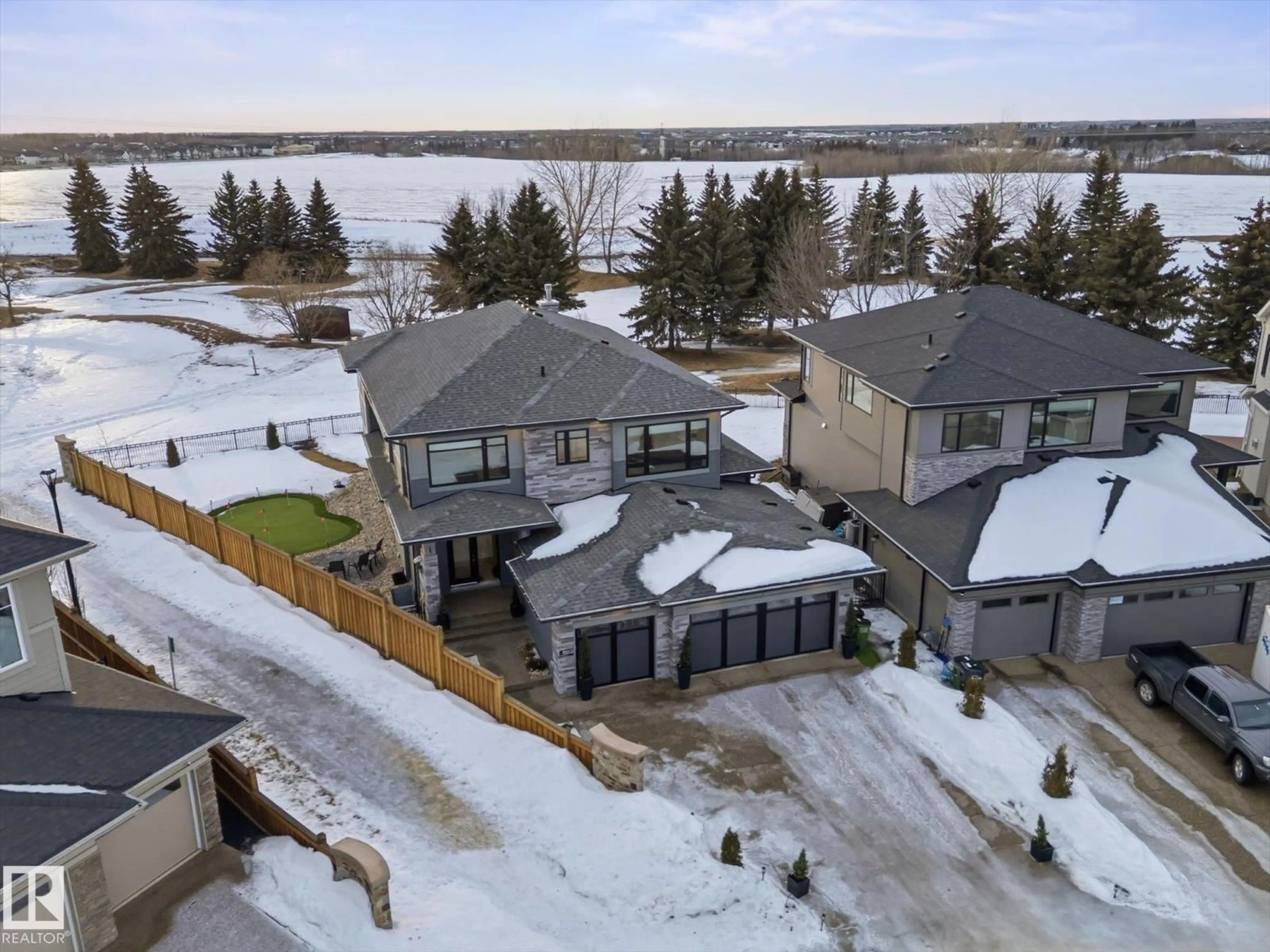 A pic from outside/outdoor area/front of a property/back of a property/a pic from drone, water/lake/river/ocean view for SW - 1562 HOWES PL, Edmonton Alberta T6W5C1