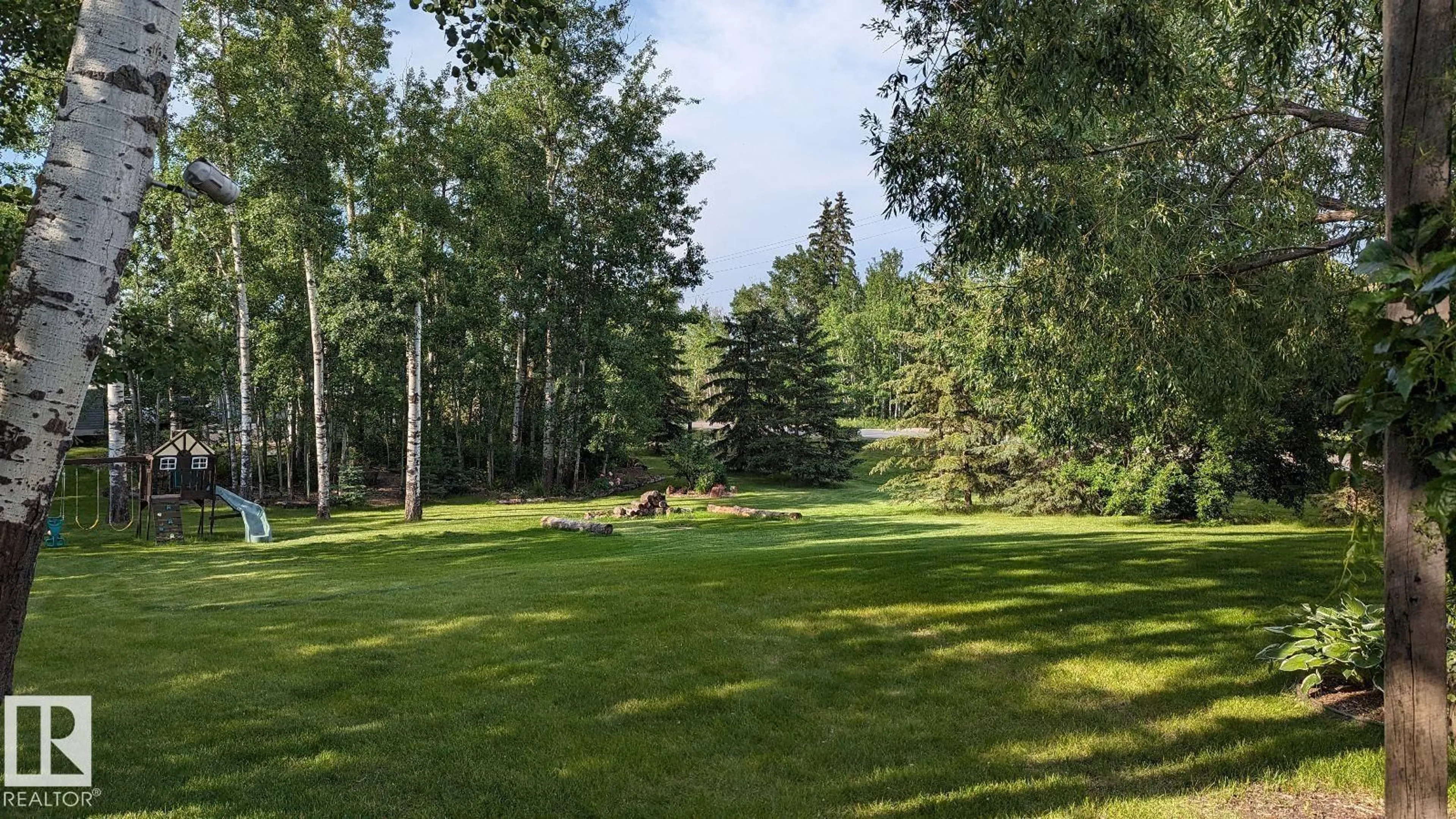 A pic from outside/outdoor area/front of a property/back of a property/a pic from drone, forest/trees view for 54500 - 106 RGE ROAD 275, Rural Sturgeon County Alberta T8R1Z1