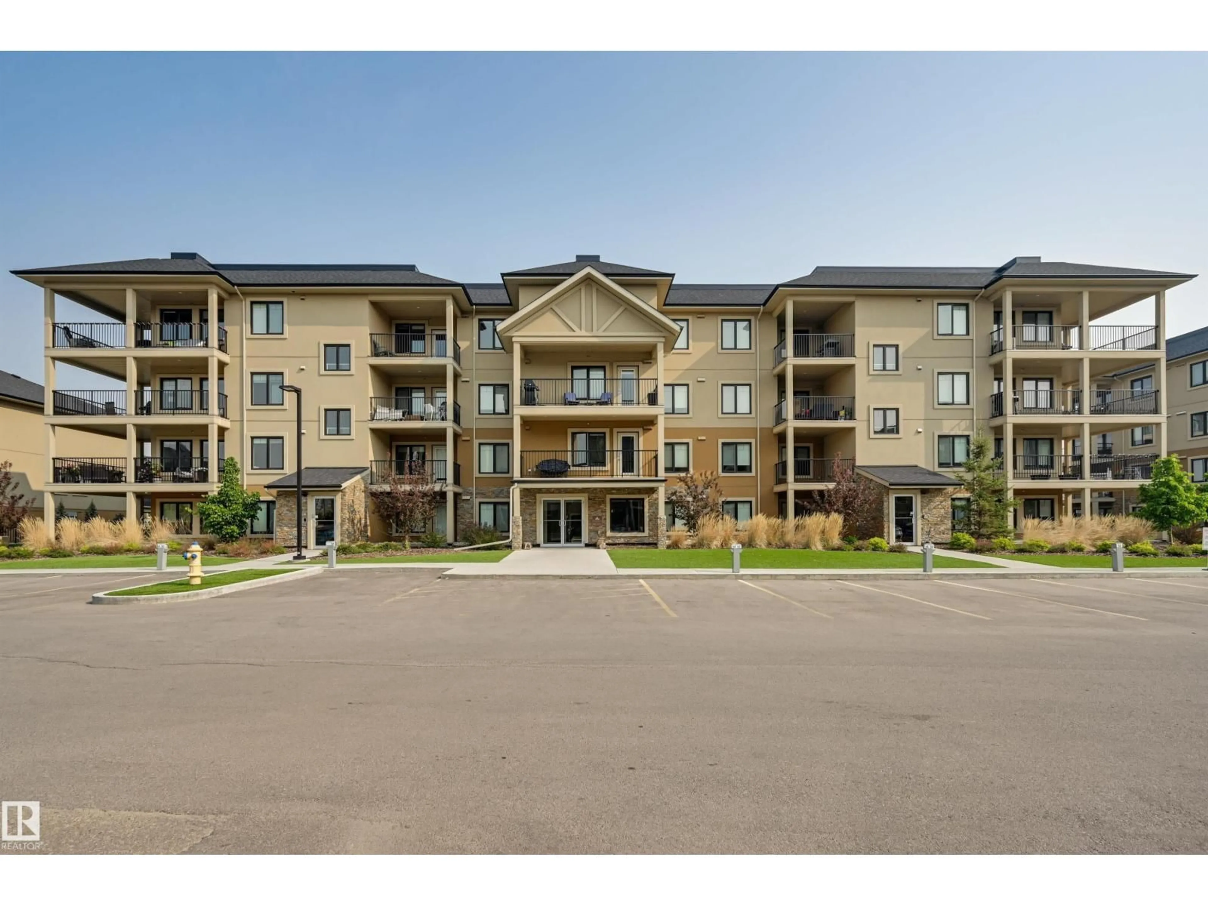 A pic from outside/outdoor area/front of a property/back of a property/a pic from drone, unknown for #201 - 1027 173 ST, Edmonton Alberta T6W3E4