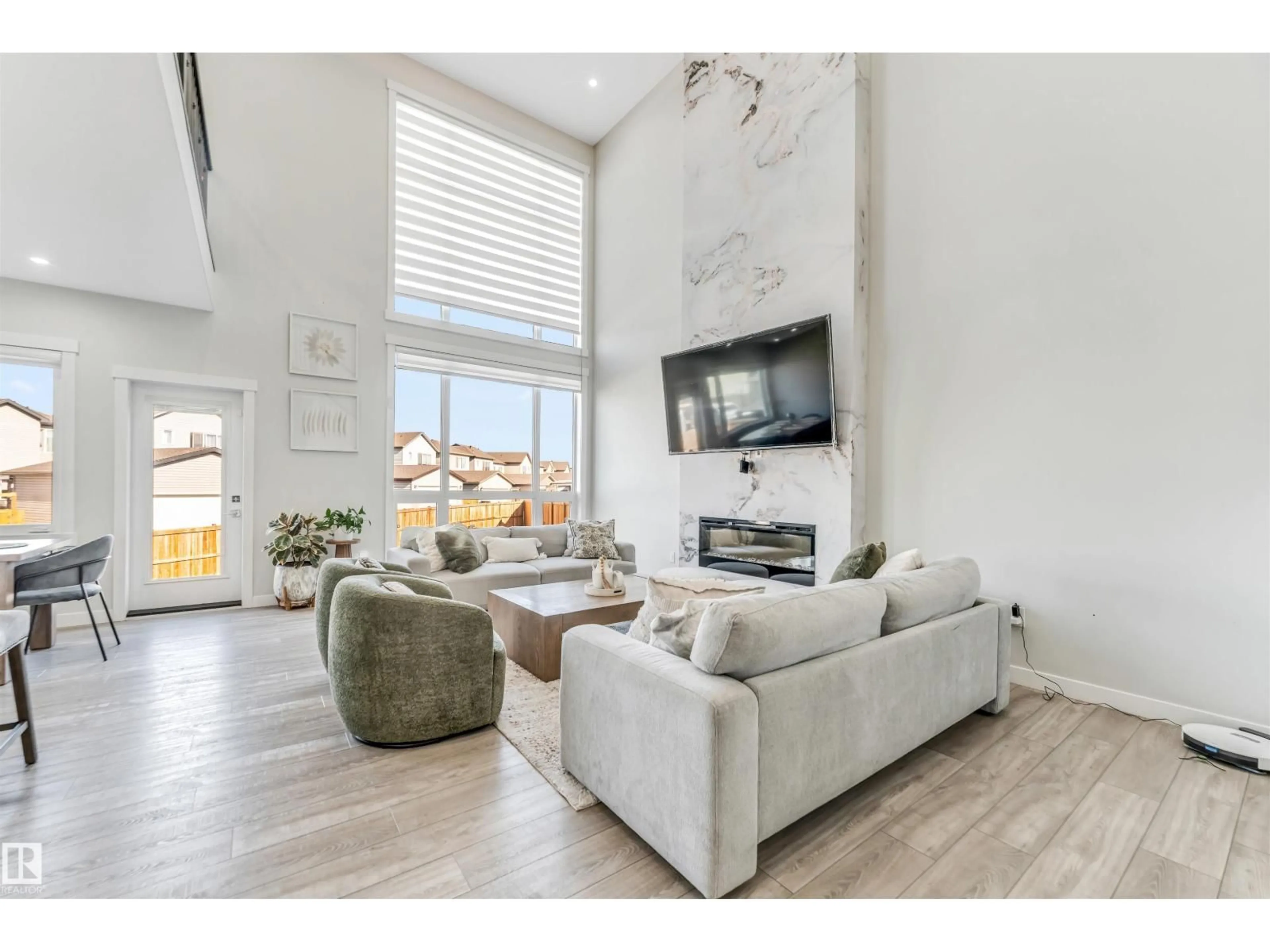 Living room with furniture, unknown for 2404 13 AV, Edmonton Alberta T6T0V1