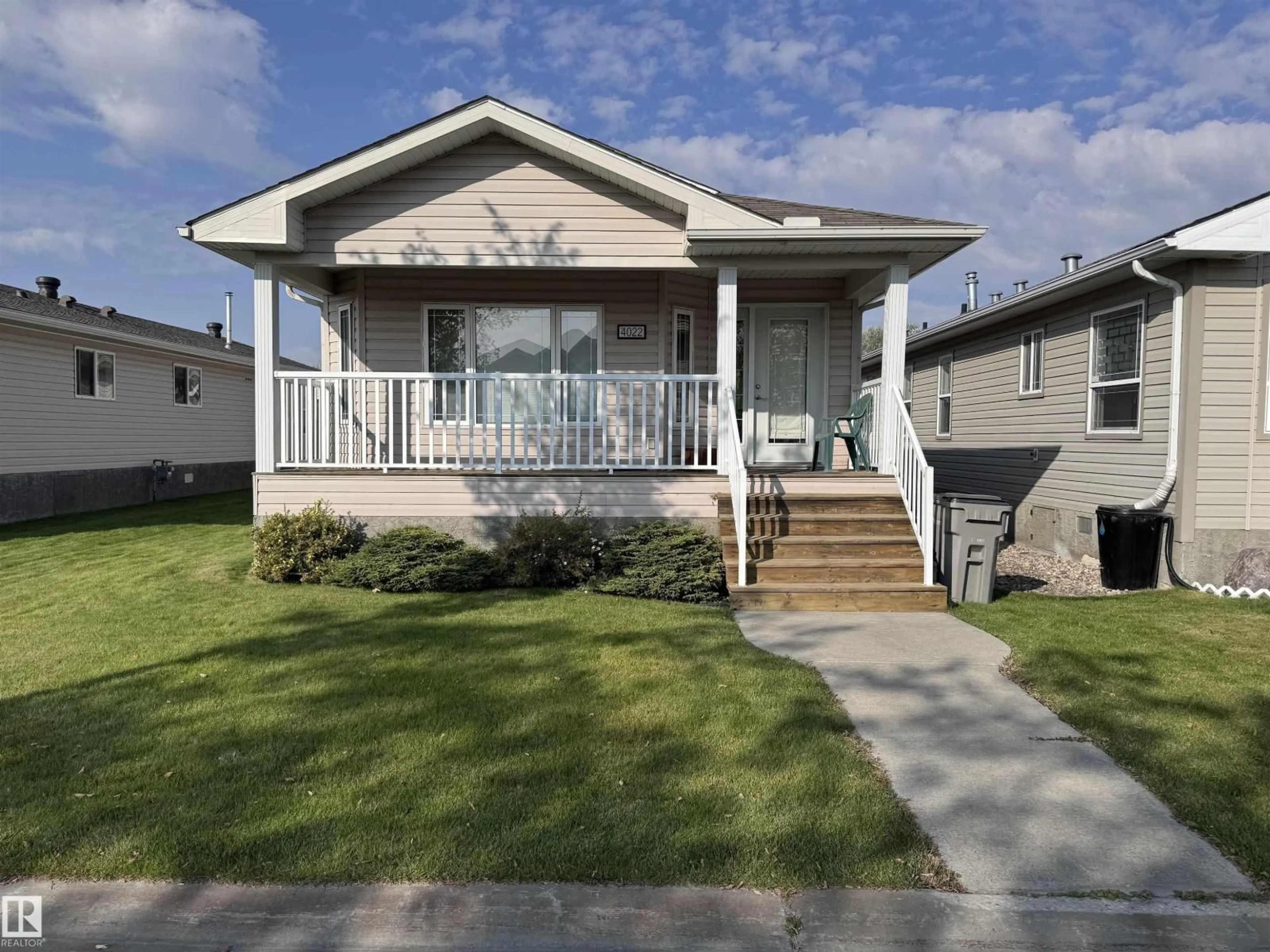 Home with vinyl exterior material, street for 4022 ASPEN WY, Leduc Alberta T9E8P9