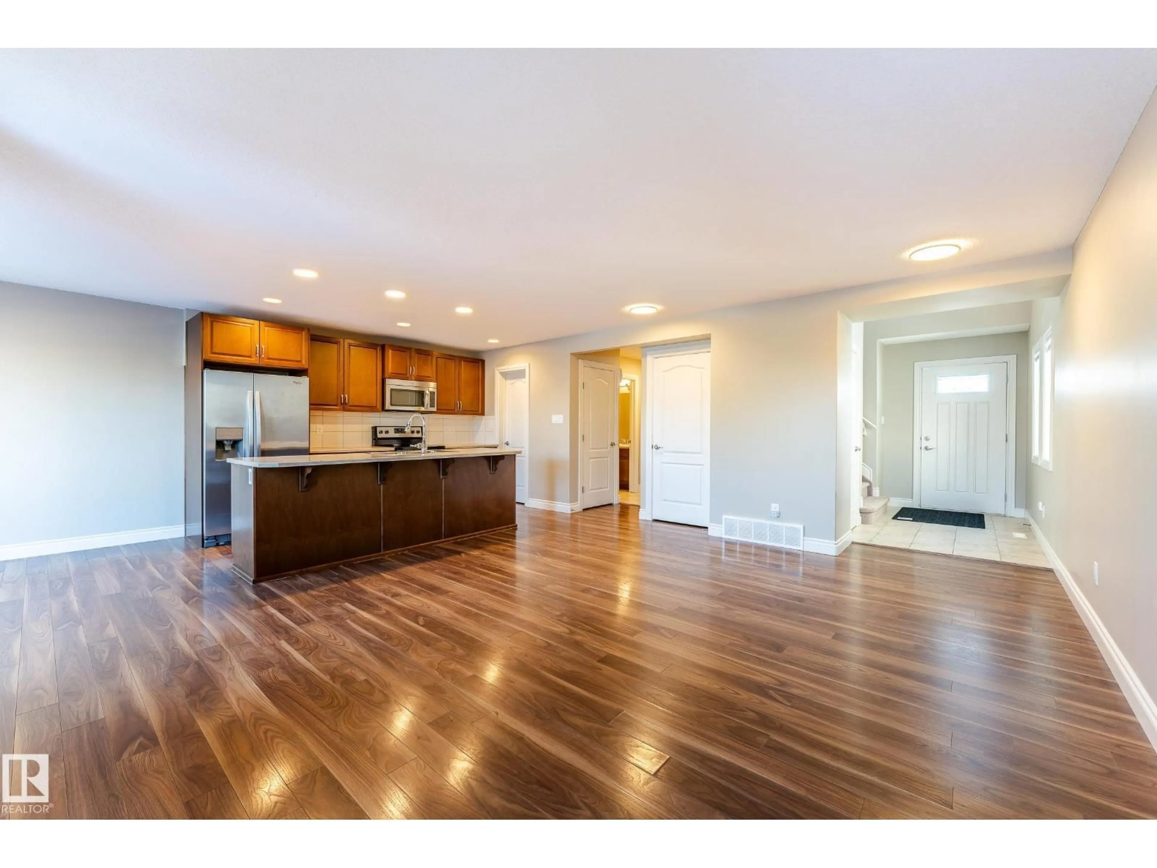 Open concept kitchen, wood/laminate floor for 17614 8 AVENUE SW, Edmonton Alberta T6W2X3