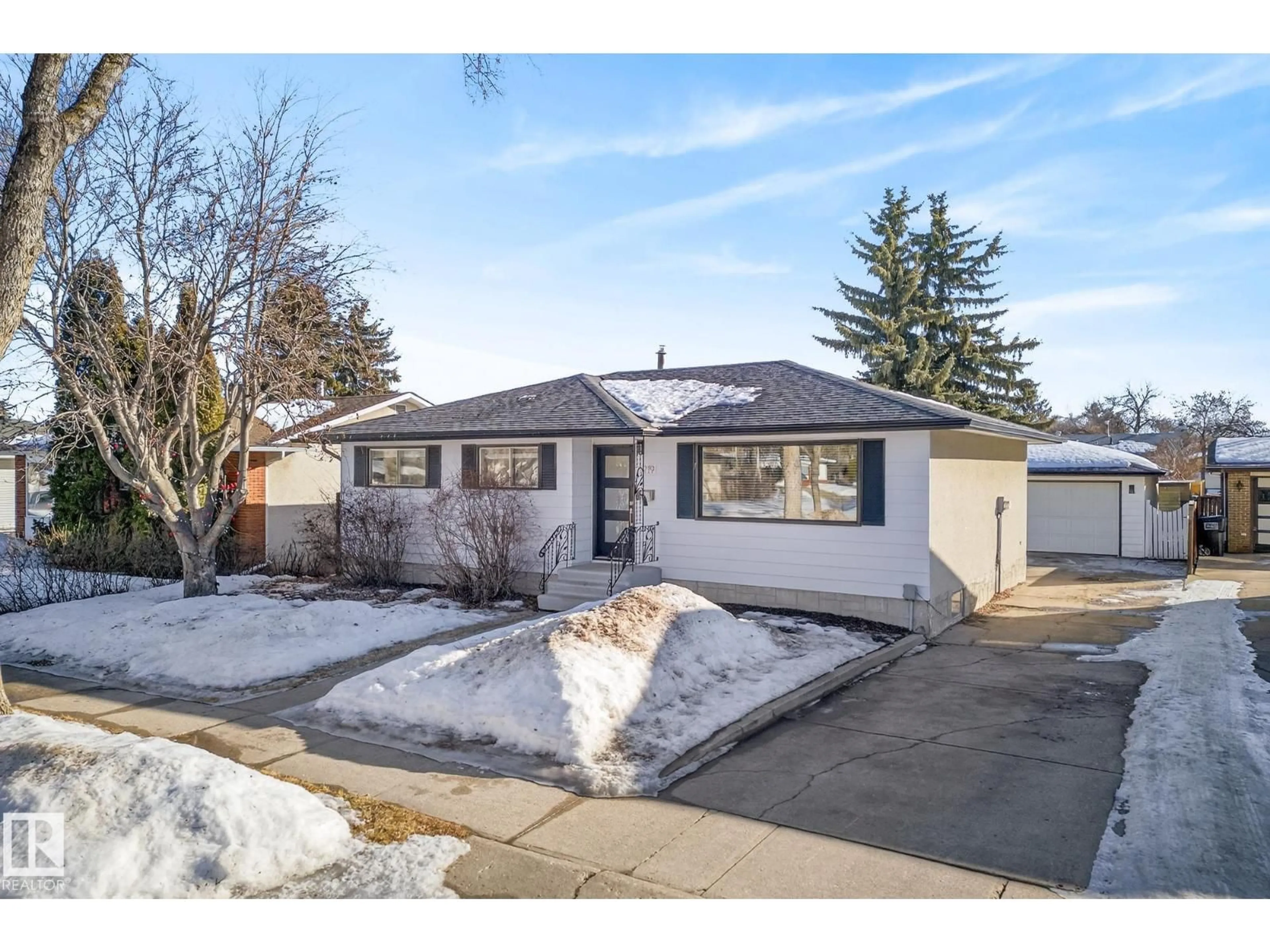 Home with brick exterior material, street for 6219 150 AV, Edmonton Alberta T5A1W7