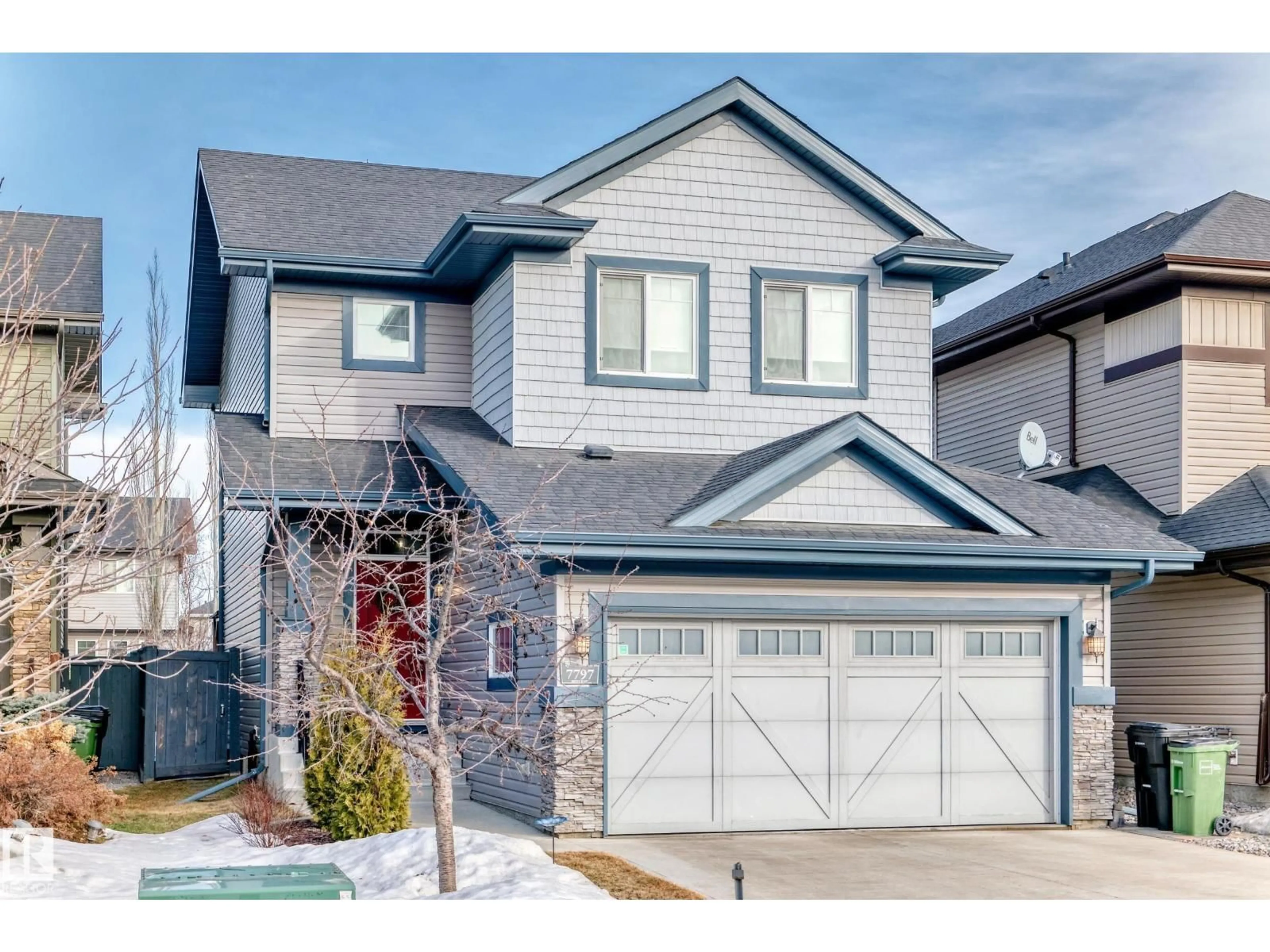 Home with vinyl exterior material, street for NW - 7797 GETTY WD, Edmonton Alberta T5T7A9