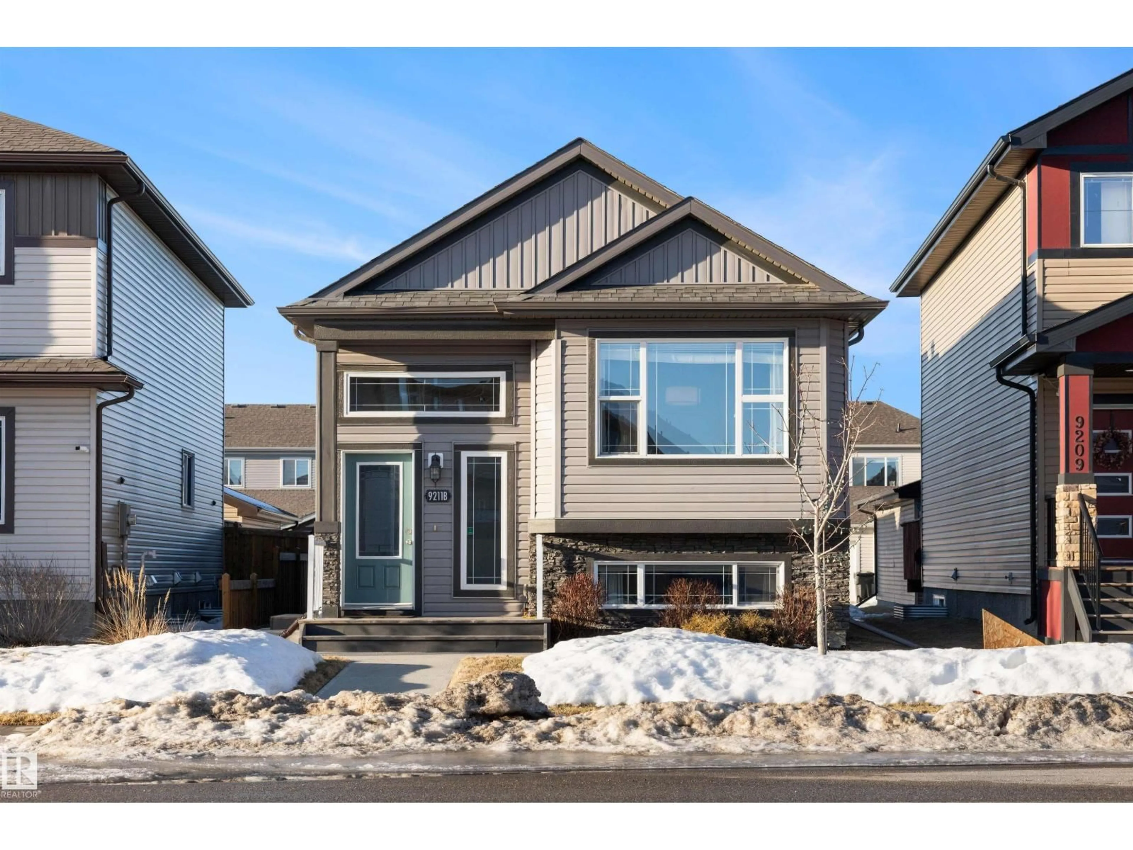 Home with vinyl exterior material, street for 9211 COOPER CR, Edmonton Alberta T6W3L1