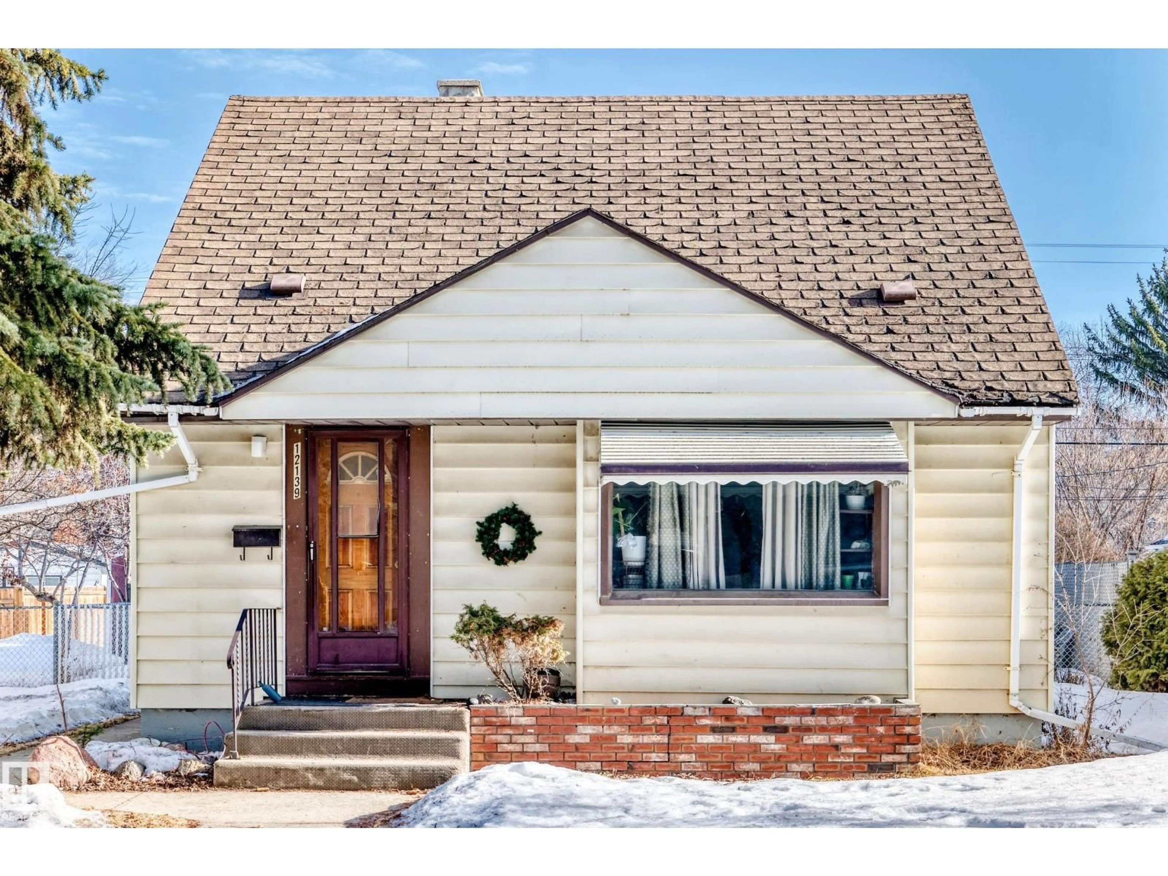 Home with vinyl exterior material, street for NW - 12139 59 ST, Edmonton Alberta T5W3Y4