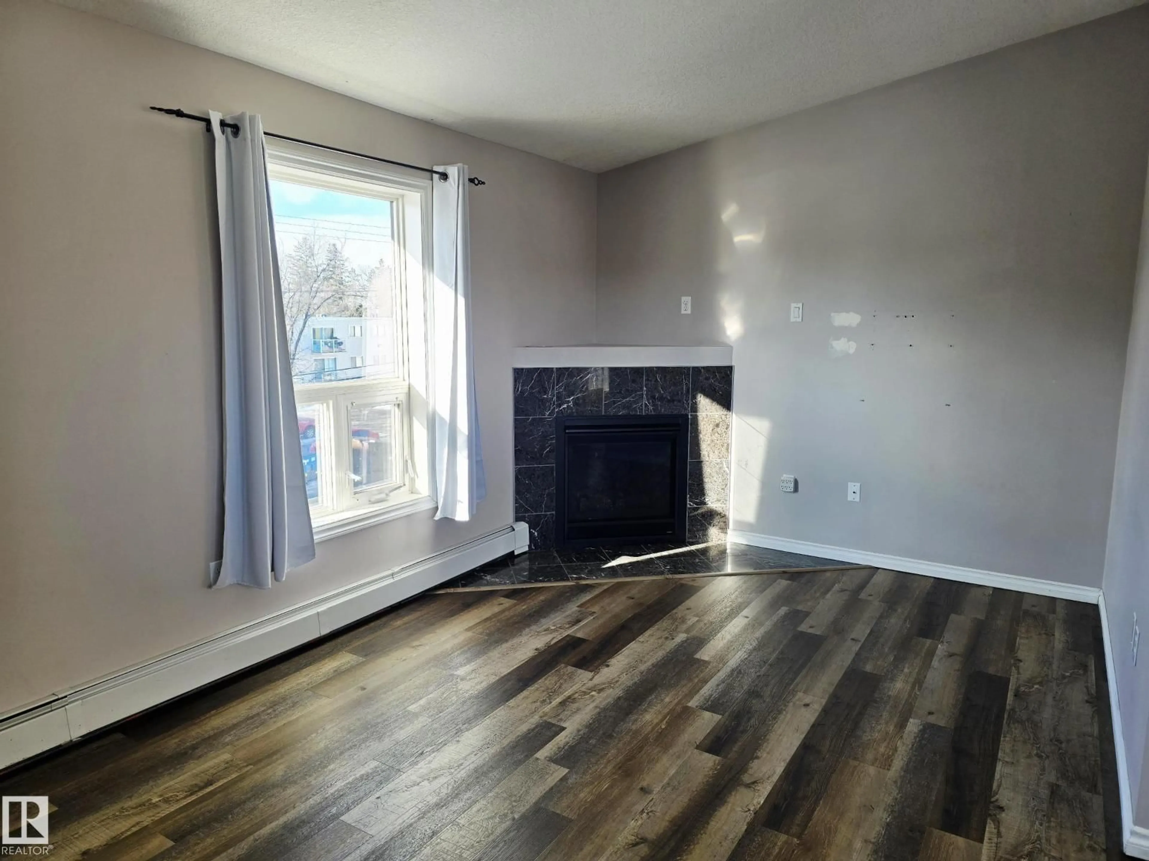 A pic of a room for #401 - 10710 116 ST, Edmonton Alberta T5N3A5