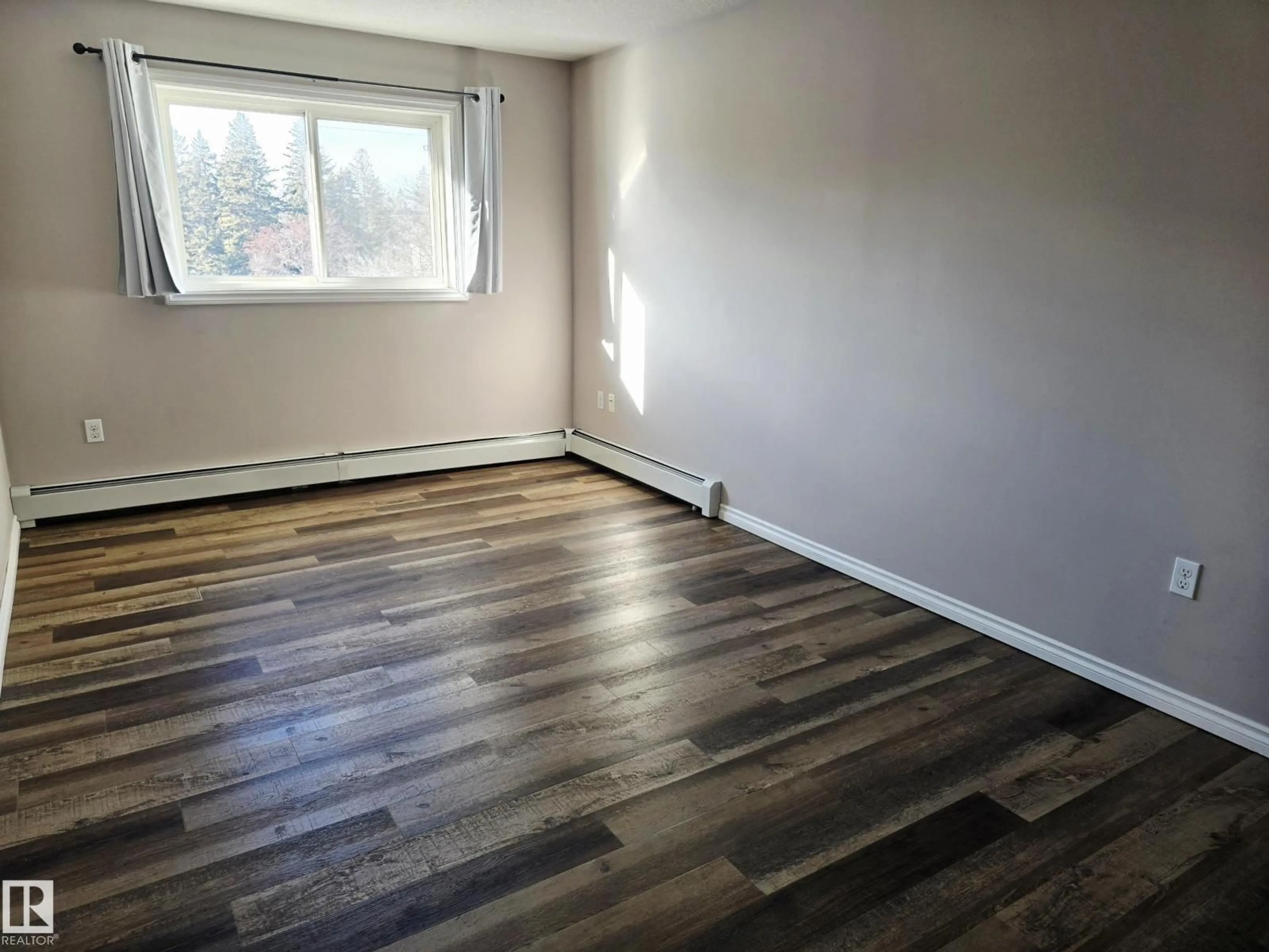 A pic of a room for #401 - 10710 116 ST, Edmonton Alberta T5N3A5