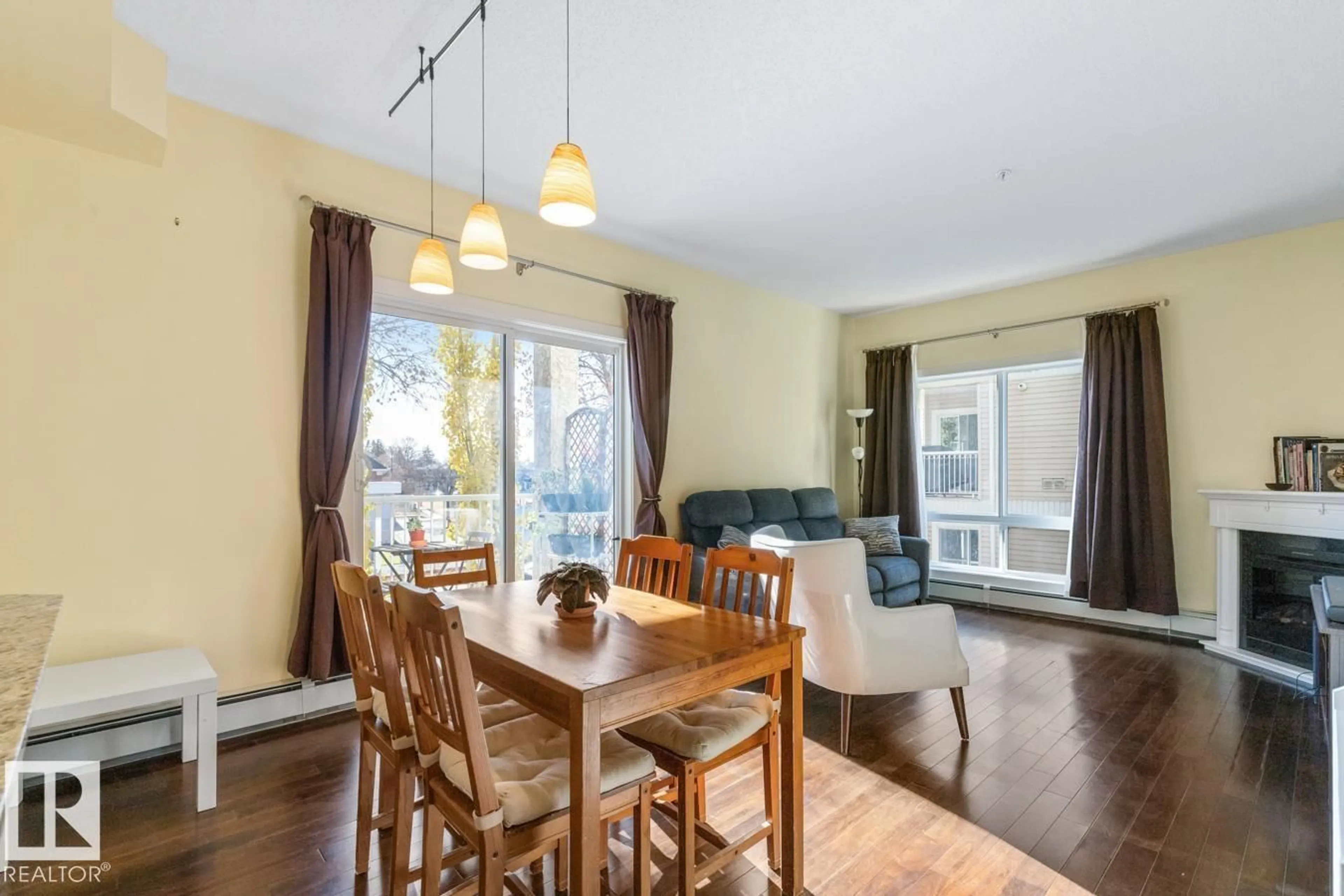 Dining room, wood/laminate floor for 202 - 10524 77 AV, Edmonton Alberta T6E1N1