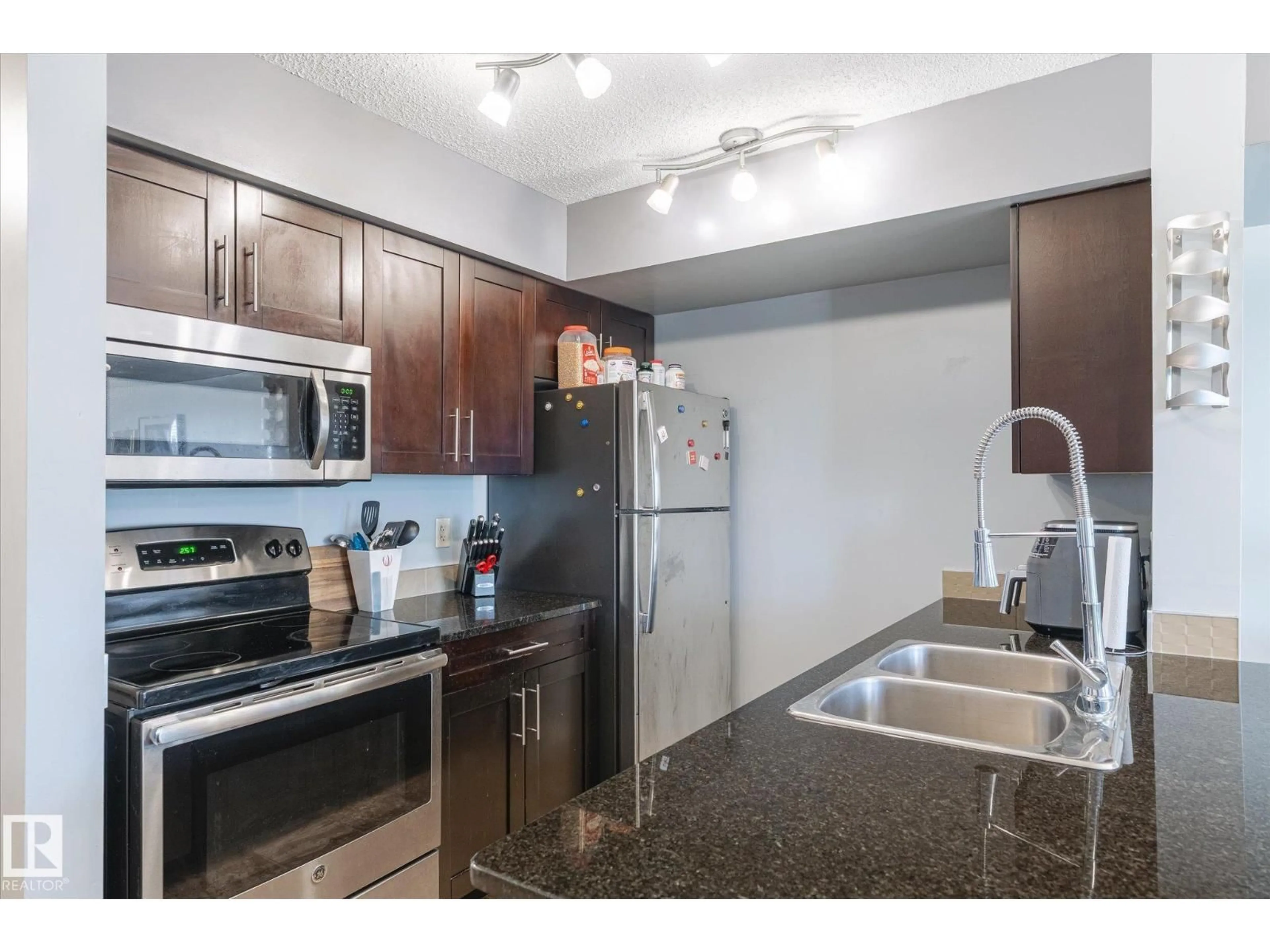 Standard kitchen, unknown for #115 - 3315 JAMES MOWATT TR, Edmonton Alberta T6W3L9