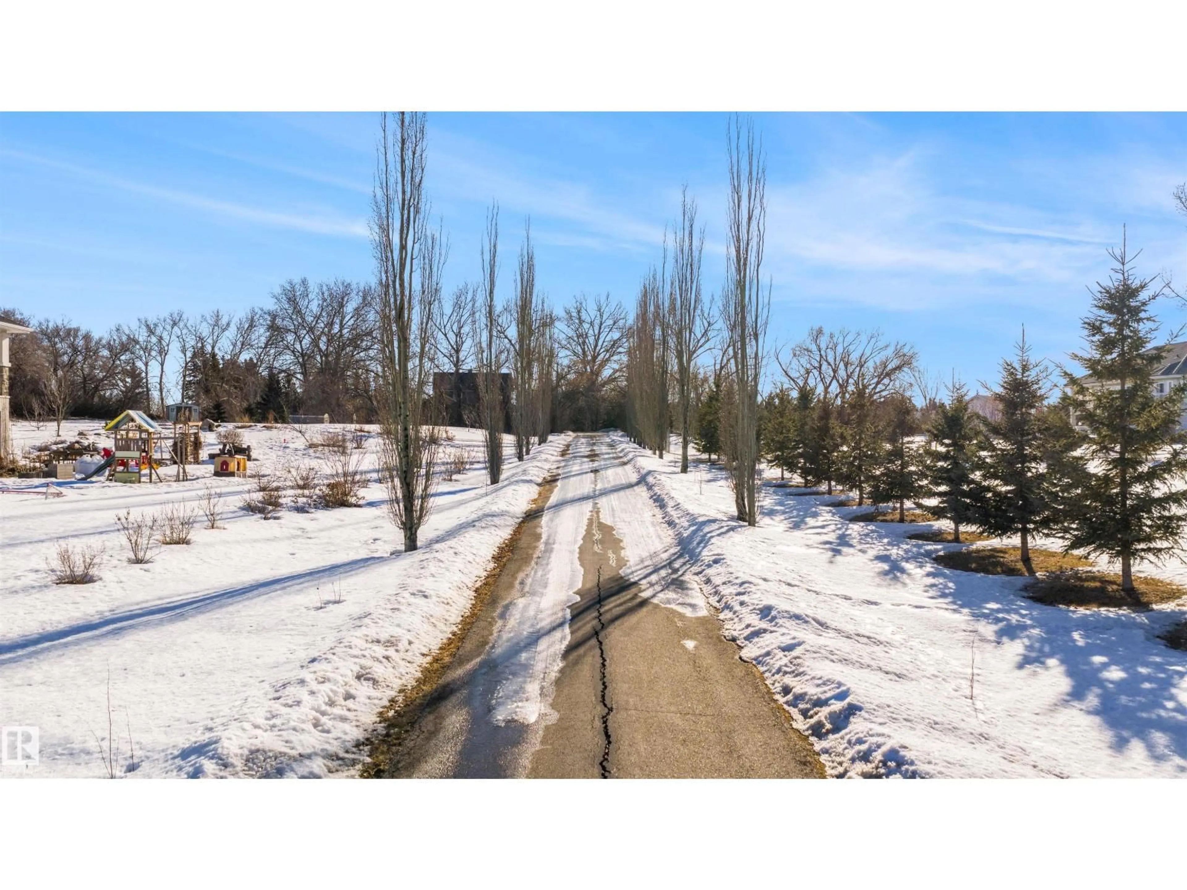A pic from outside/outdoor area/front of a property/back of a property/a pic from drone, unknown for 52216 - 172 RANGE ROAD 233, Rural Strathcona County Alberta T8B1C9