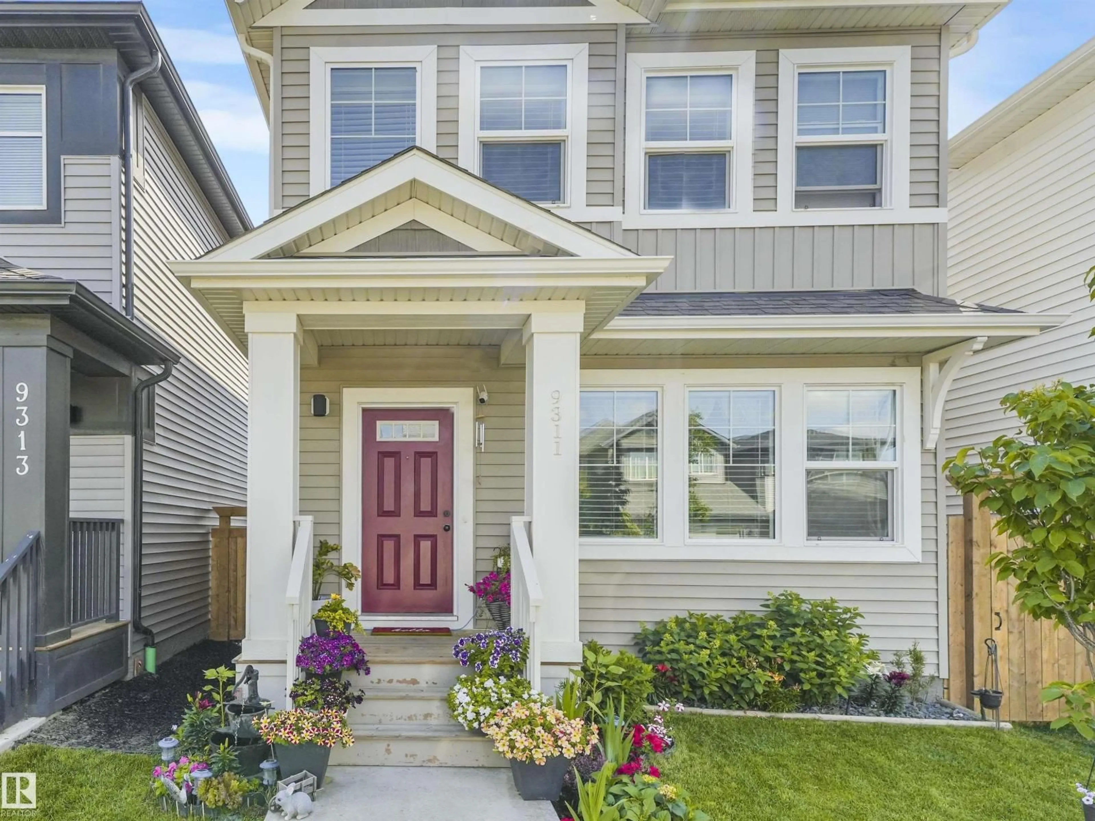 Home with vinyl exterior material, street for 9311 226 ST, Edmonton Alberta T5T7R5