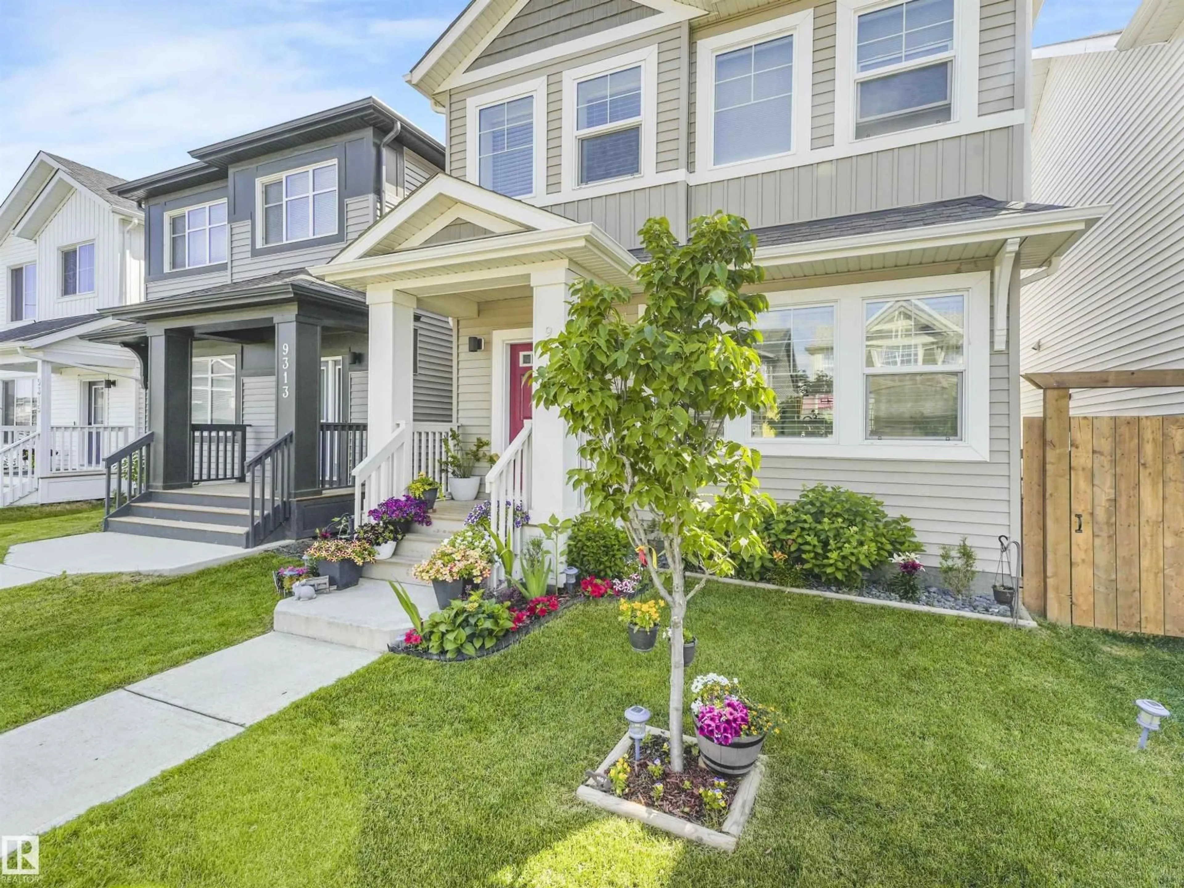 Home with vinyl exterior material, street for 9311 226 ST, Edmonton Alberta T5T7R5