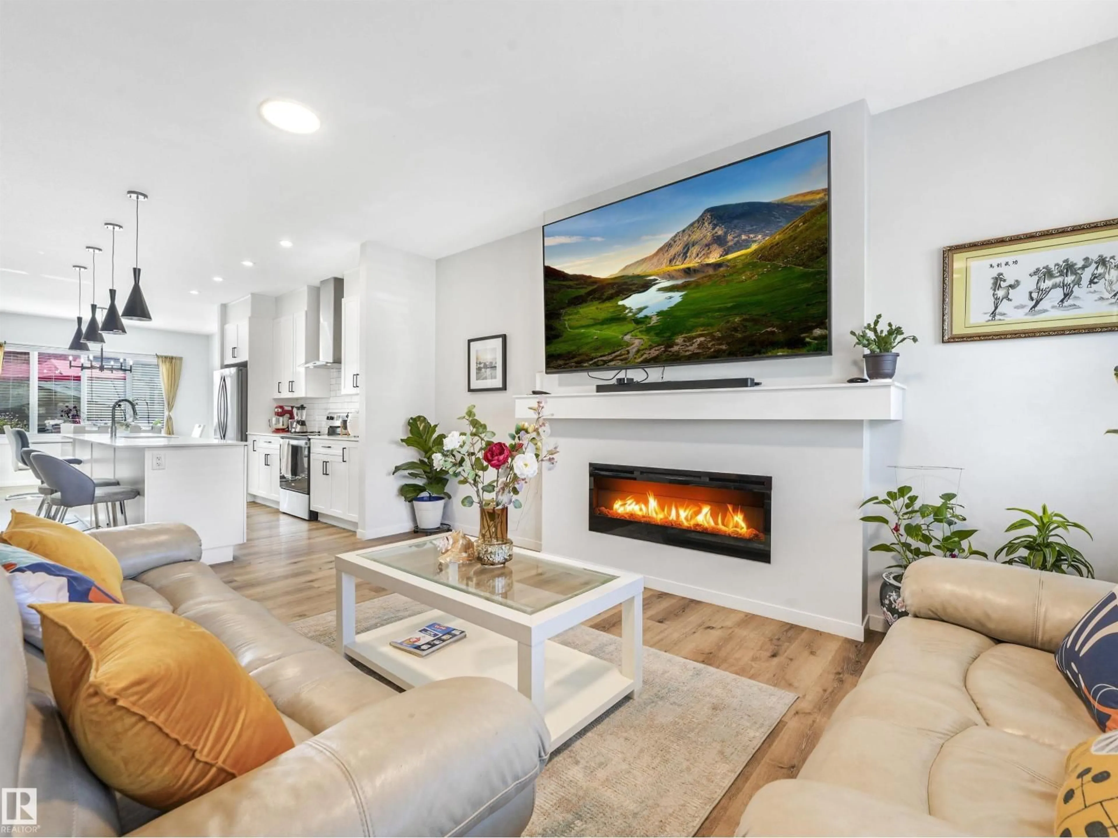 Living room with furniture, wood/laminate floor for 9311 226 ST, Edmonton Alberta T5T7R5