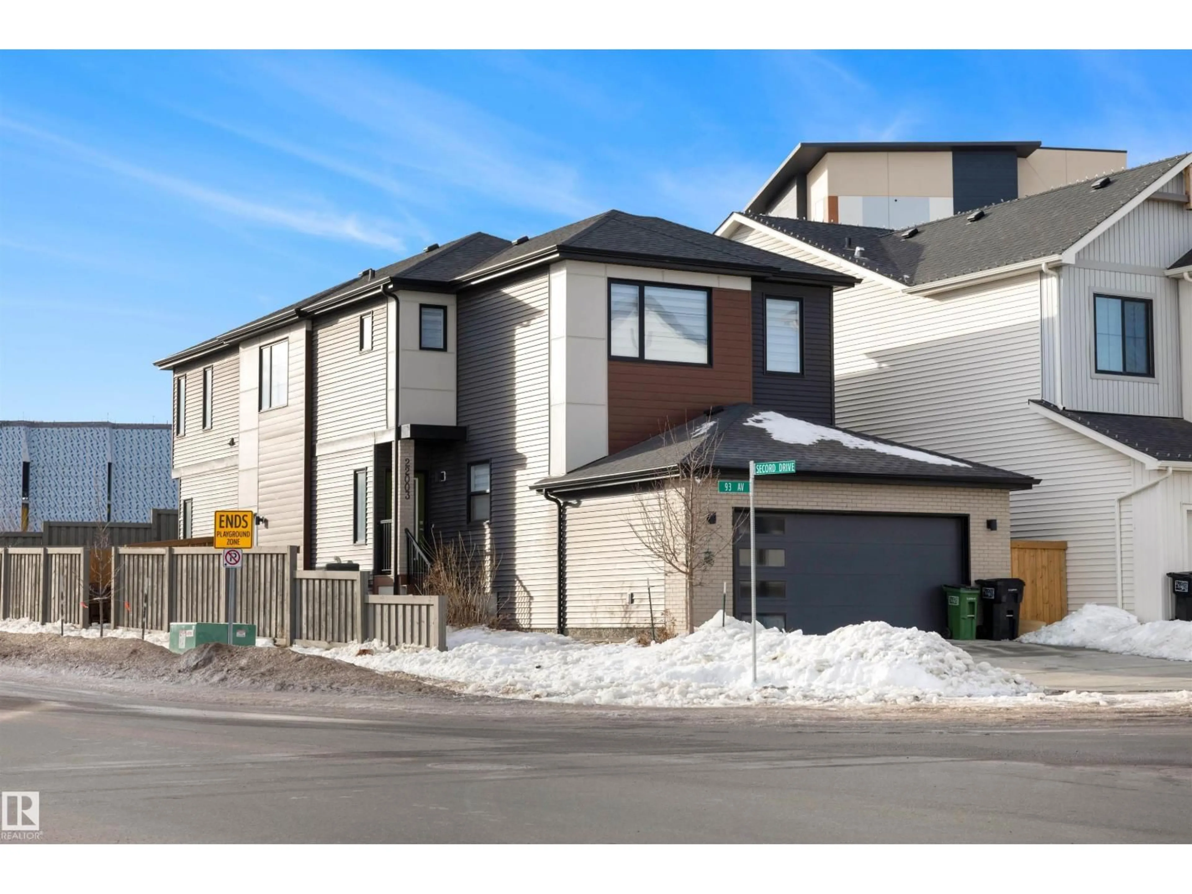 Home with brick exterior material, street for NW - 22003 93 AV, Edmonton Alberta T5T7N9