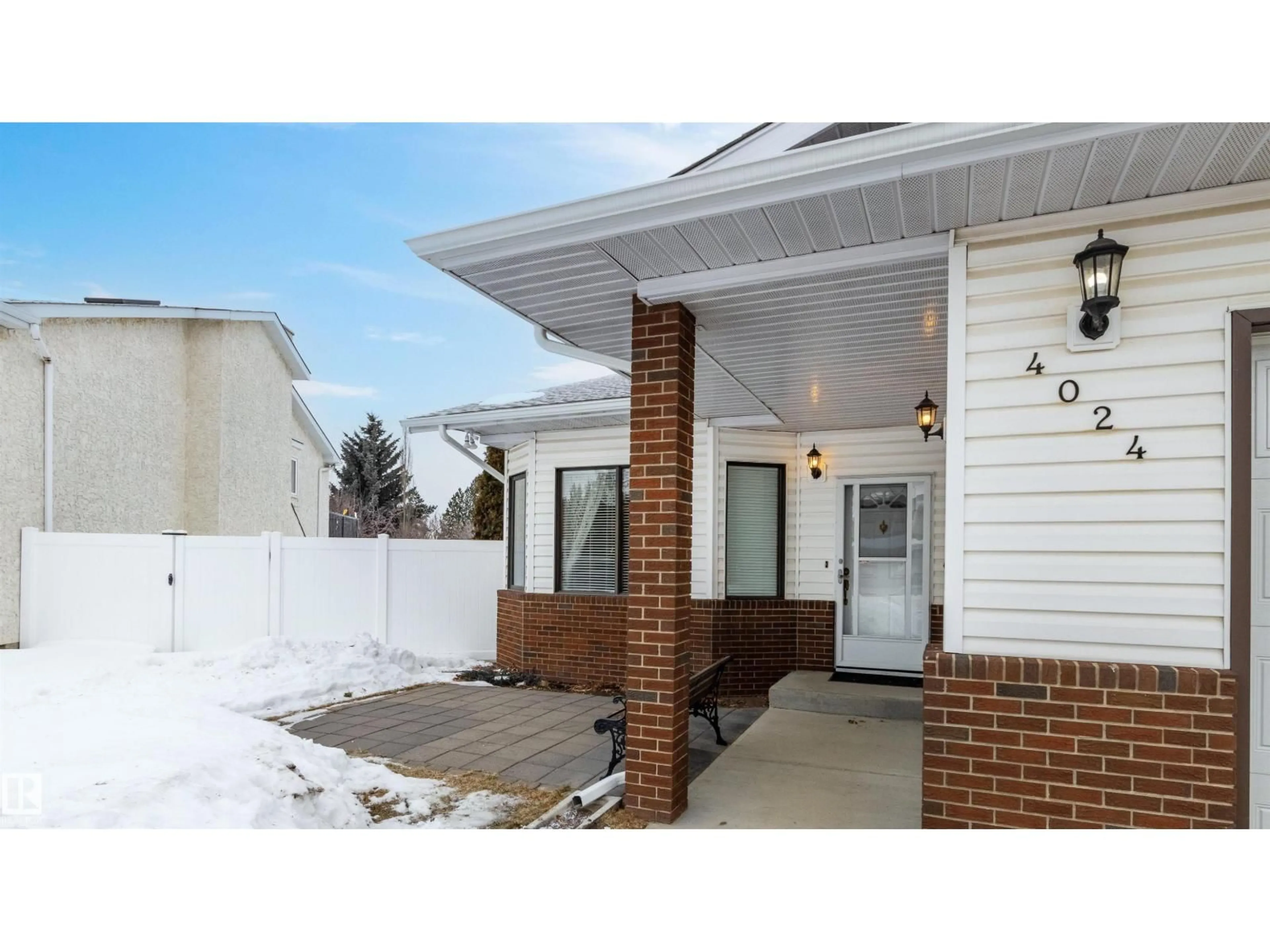 Home with brick exterior material, street for NW - 4024 28 AV, Edmonton Alberta T6L6E4