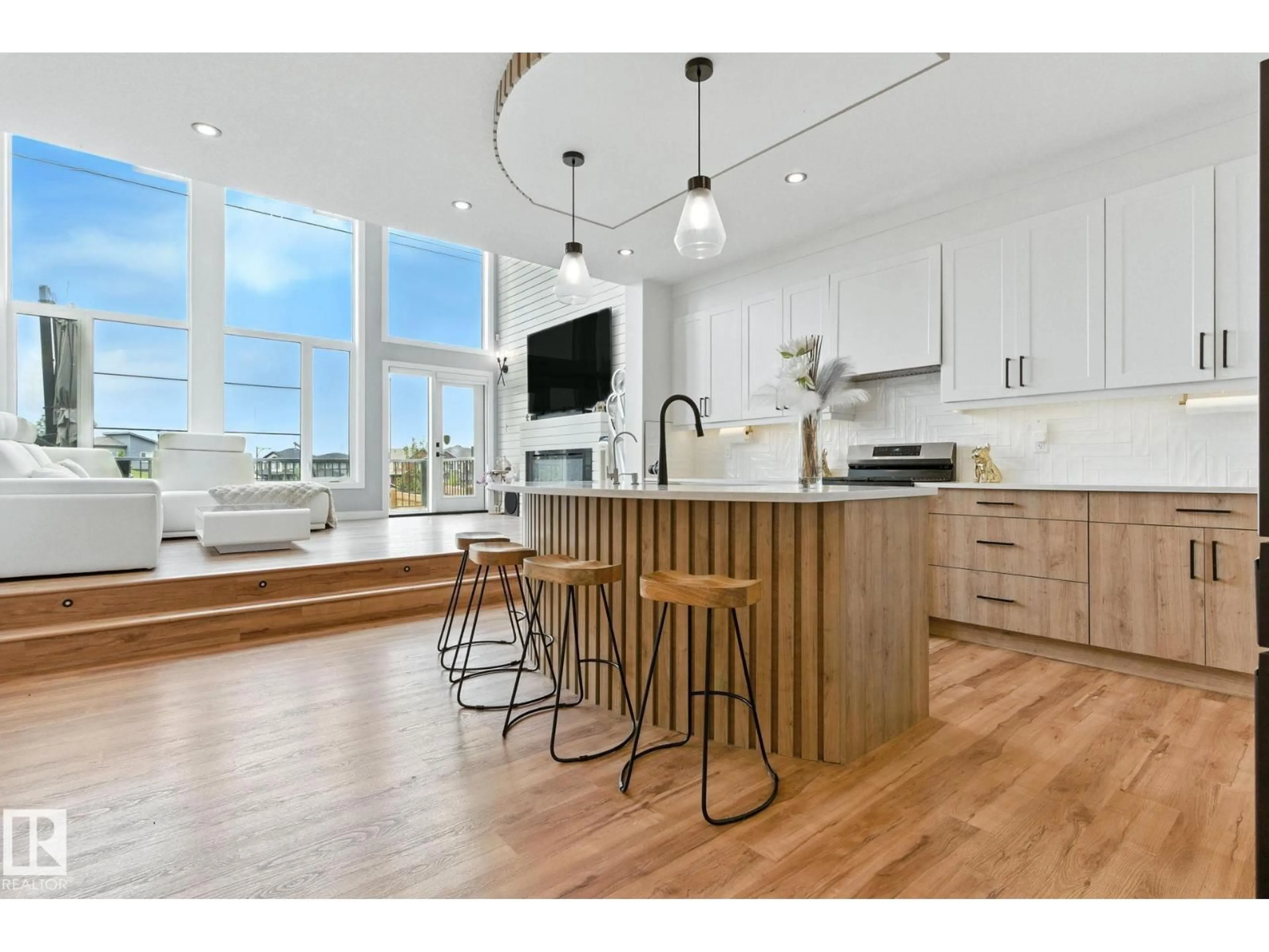 Open concept kitchen, wood/laminate floor for 1048 GOLDFINCH WY, Edmonton Alberta T5S0R2