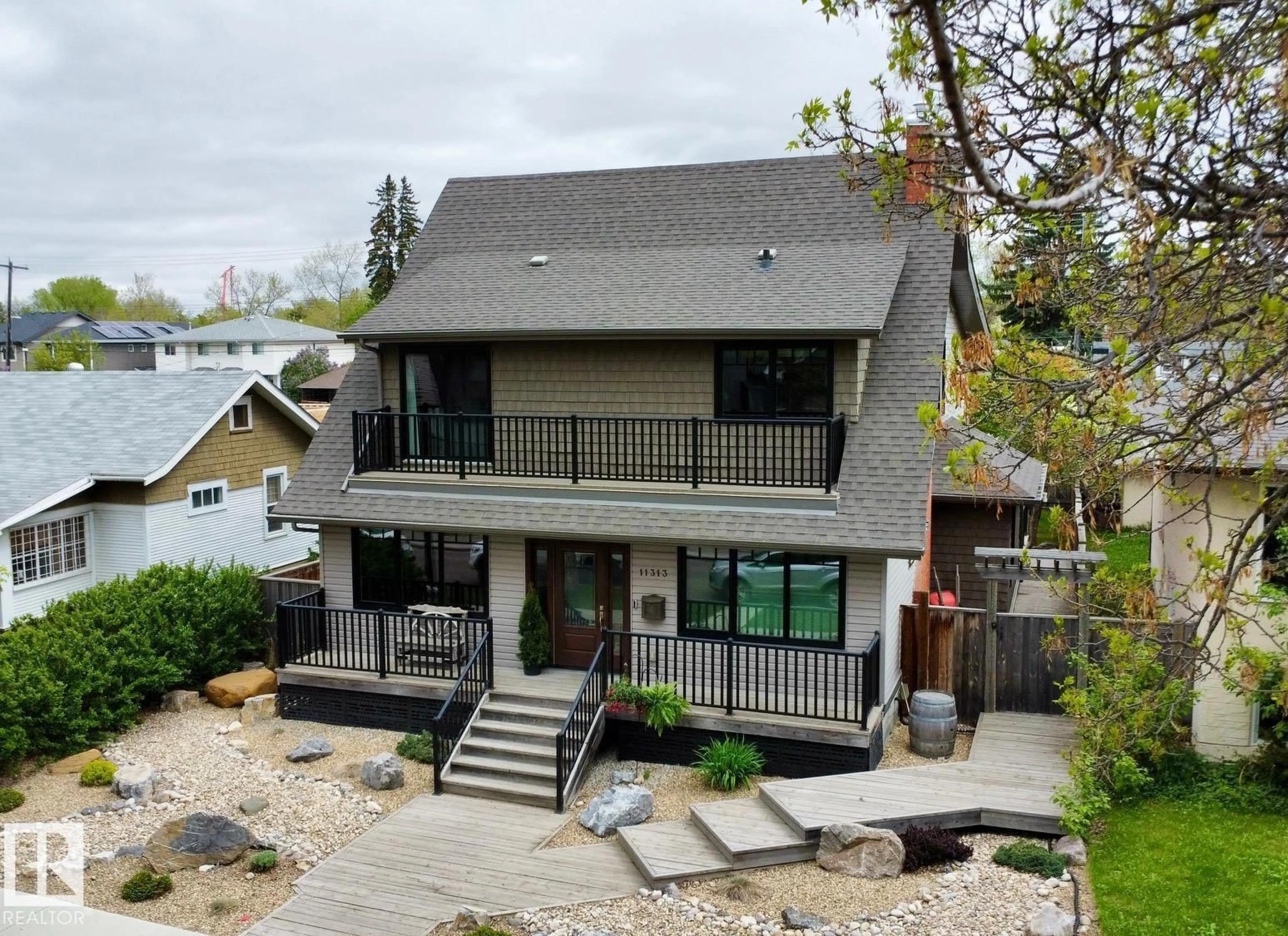 A pic from outside/outdoor area/front of a property/back of a property/a pic from drone, water/lake/river/ocean view for NW - 11313 127 ST, Edmonton Alberta T5M0T9