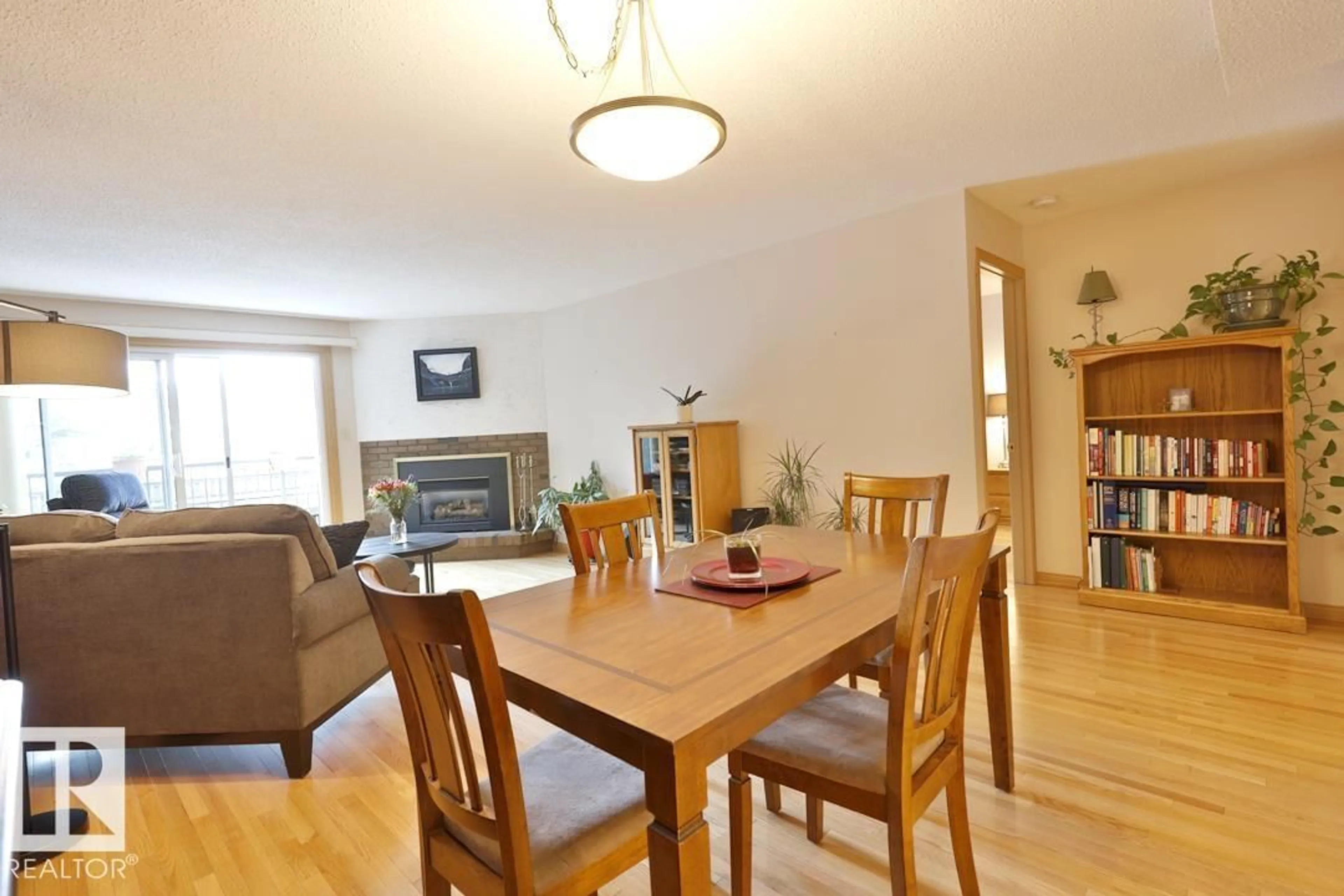 Dining room, wood/laminate floor for #102 - 10549 87 AV, Edmonton Alberta T6E2P6