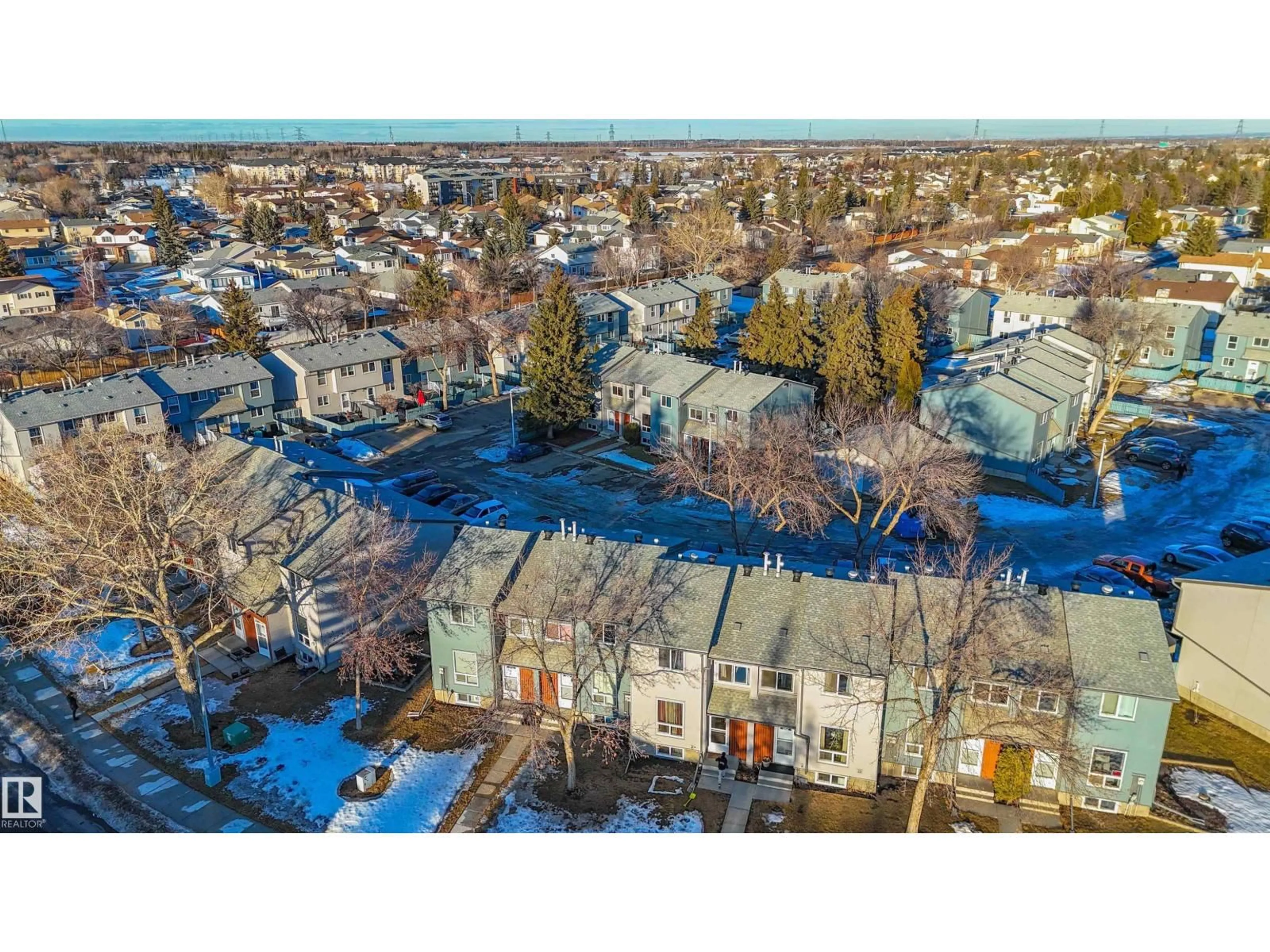 A pic from outside/outdoor area/front of a property/back of a property/a pic from drone, street for 14225 32 ST, Edmonton Alberta T5Y1H3