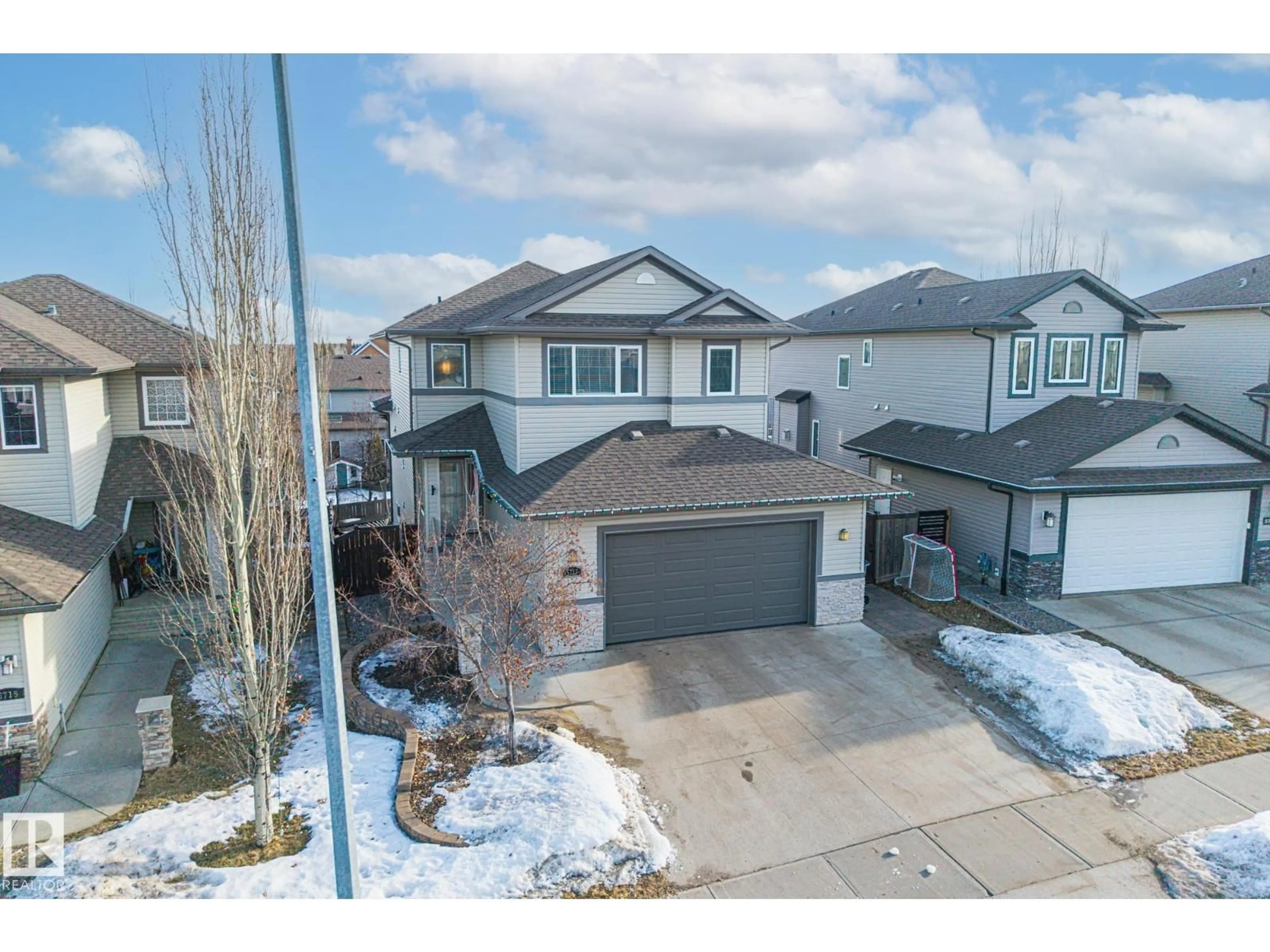 A pic from outside/outdoor area/front of a property/back of a property/a pic from drone, street for 5713 42 ST, Beaumont Alberta T4X0C2
