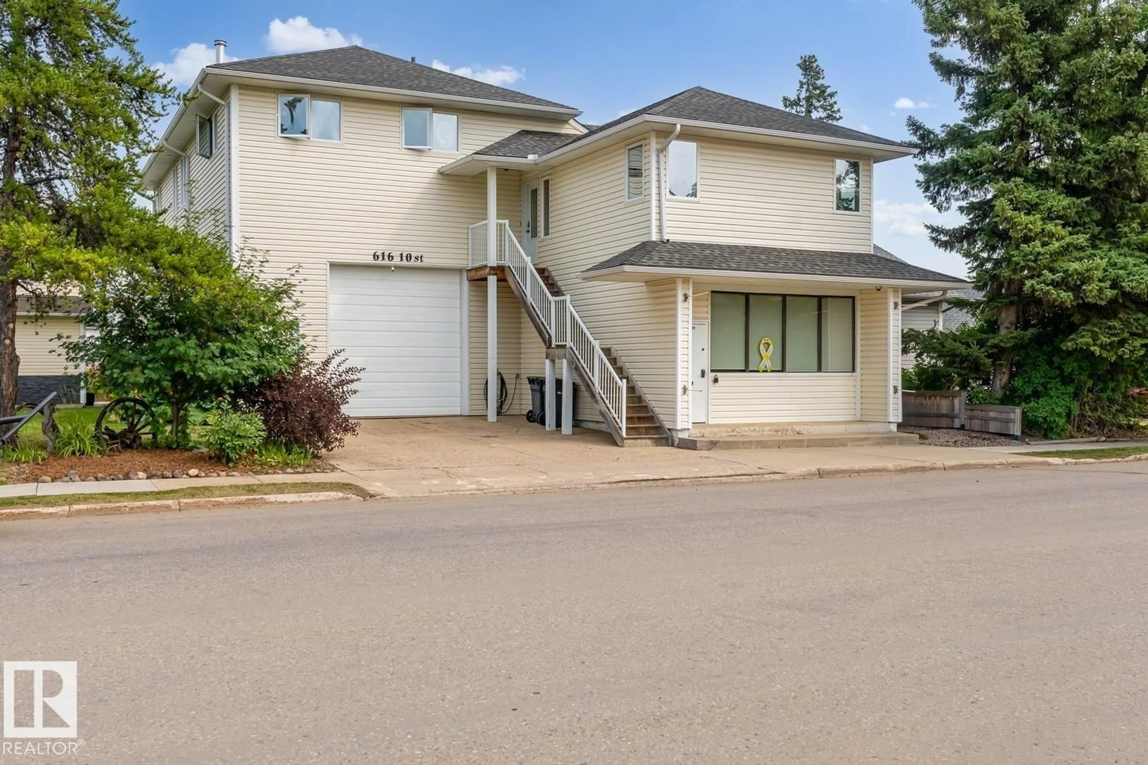A pic from outside/outdoor area/front of a property/back of a property/a pic from drone, street for 616 10 ST, Cold Lake Alberta T9M1B1