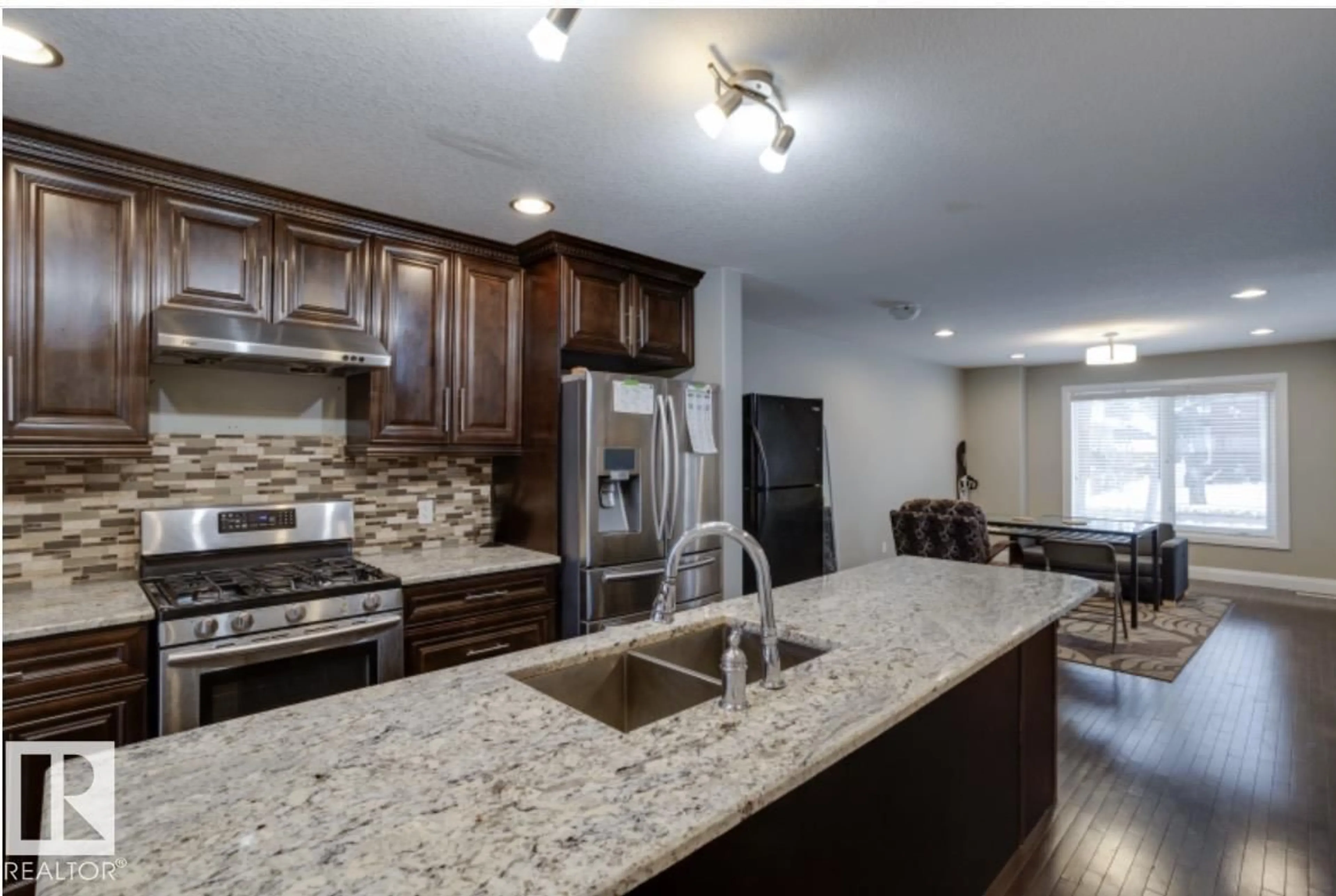 Open concept kitchen, unknown for 10935 76 AV, Edmonton Alberta T6G0J6