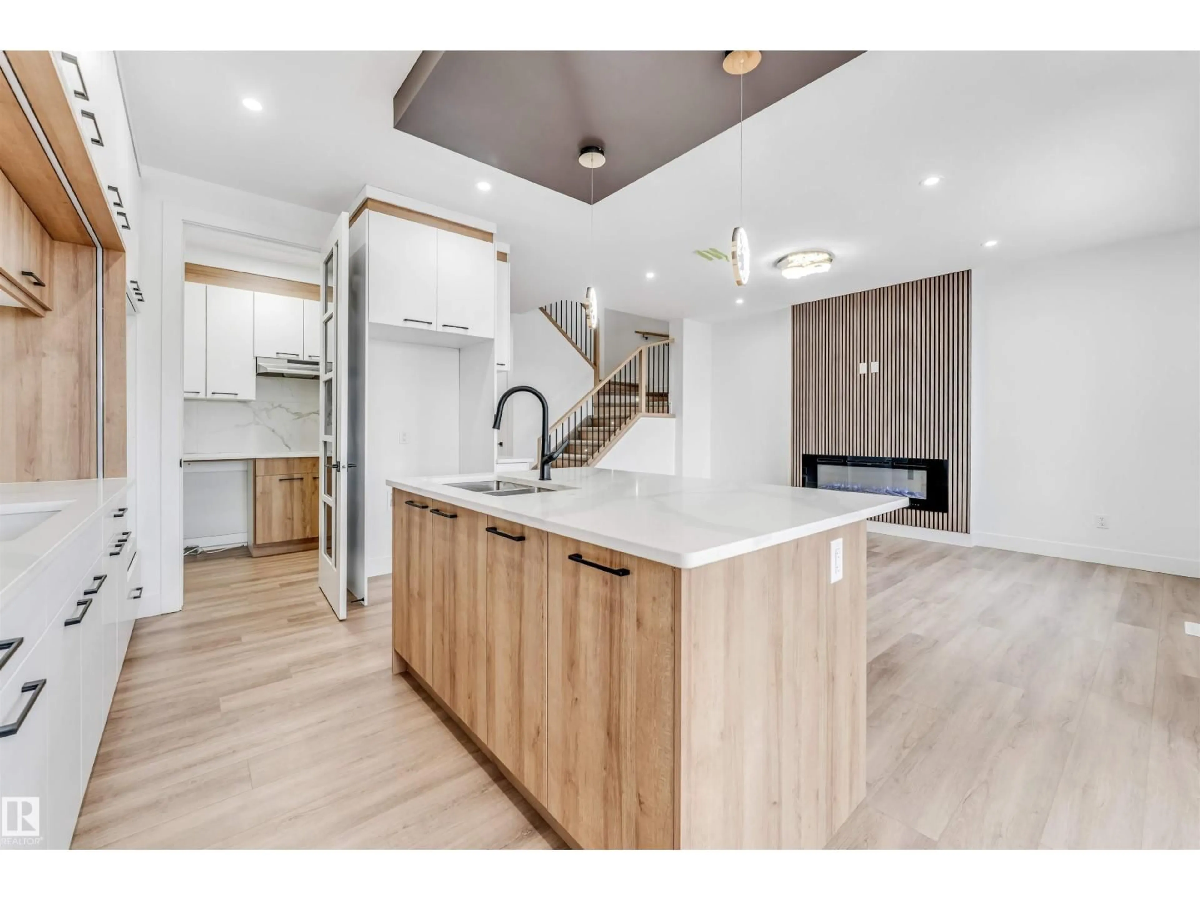 Open concept kitchen, wood/laminate floor for SW - 123 28 ST, Edmonton Alberta T6X3E3