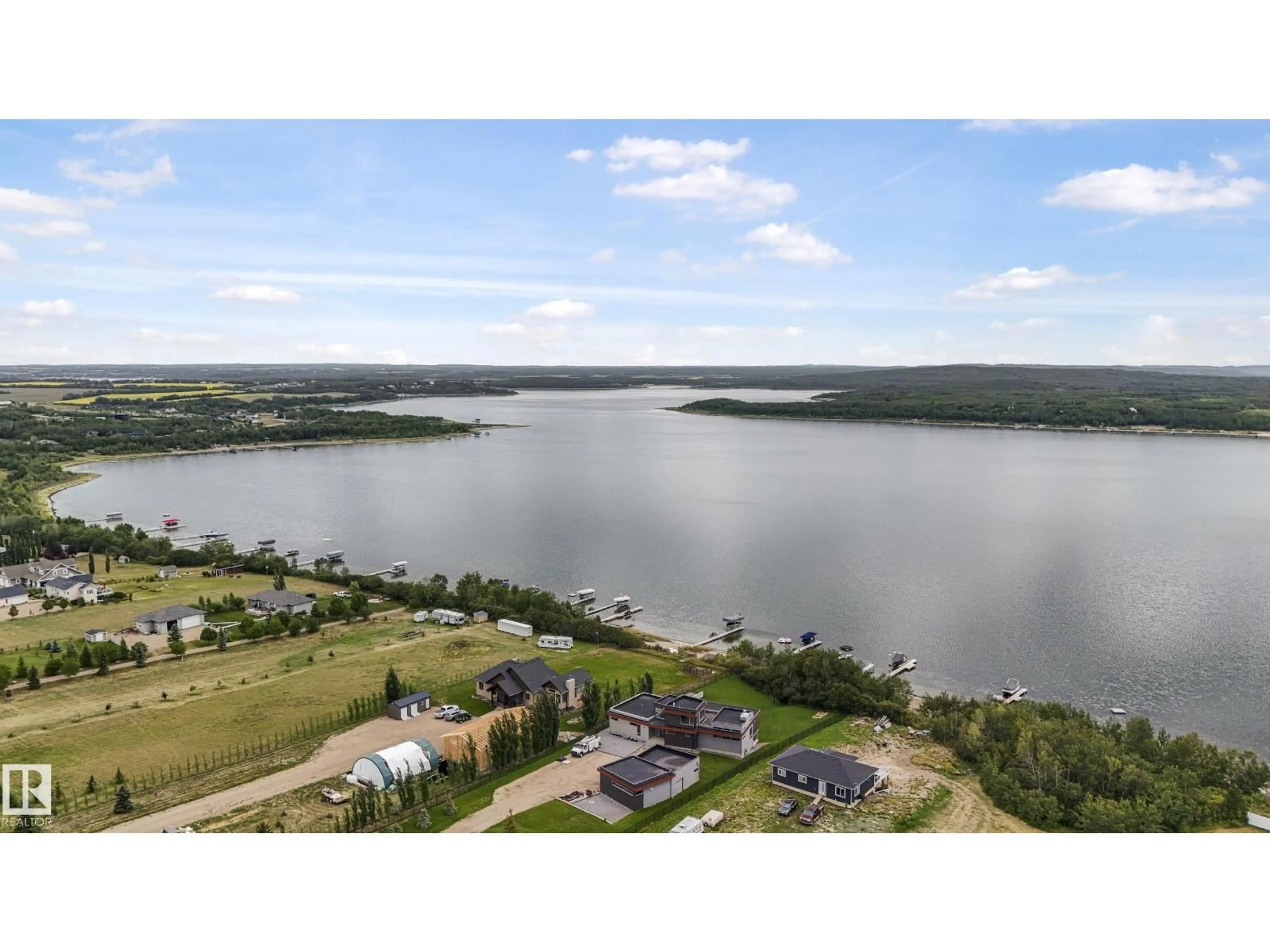 A pic from outside/outdoor area/front of a property/back of a property/a pic from drone, water/lake/river/ocean view for 562115 - 118 RR 114, Rural Two Hills County Alberta T0B4K0