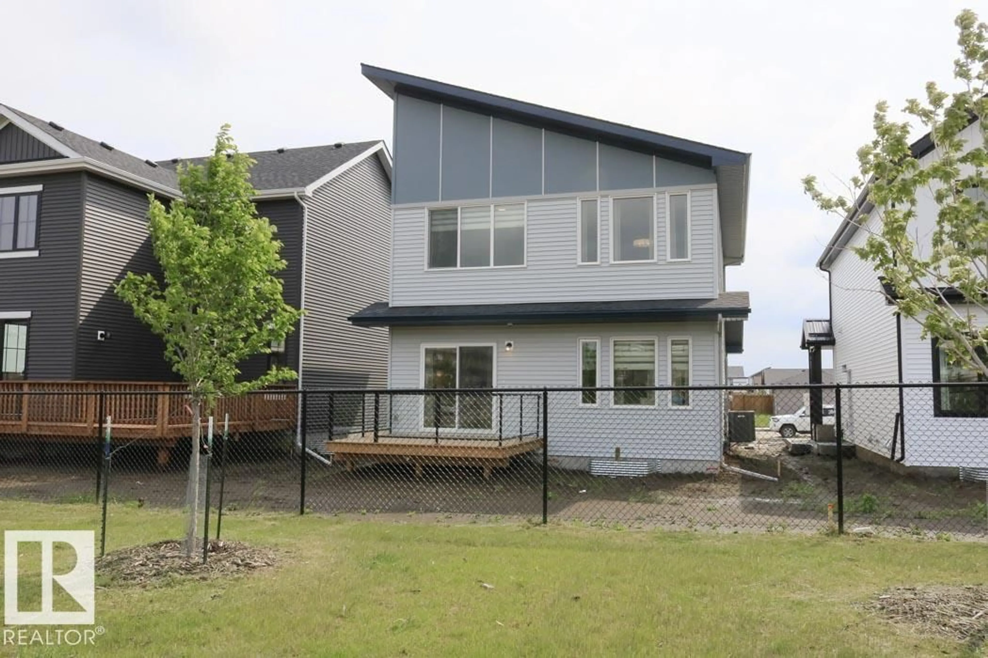 Home with vinyl exterior material, street for NW - 2656 194 ST, Edmonton Alberta T6M1K9