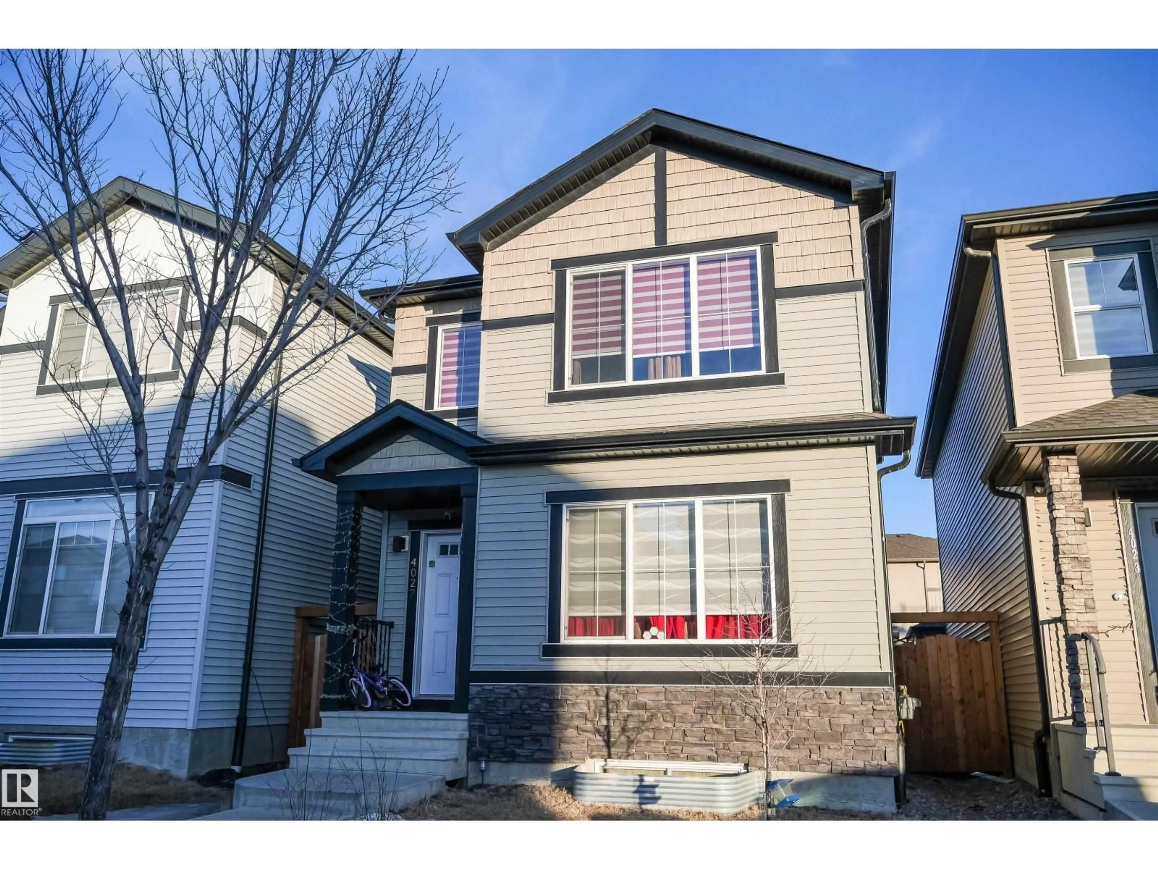 Home with vinyl exterior material, street for 4027 3 STREET, Edmonton Alberta T6T2E8