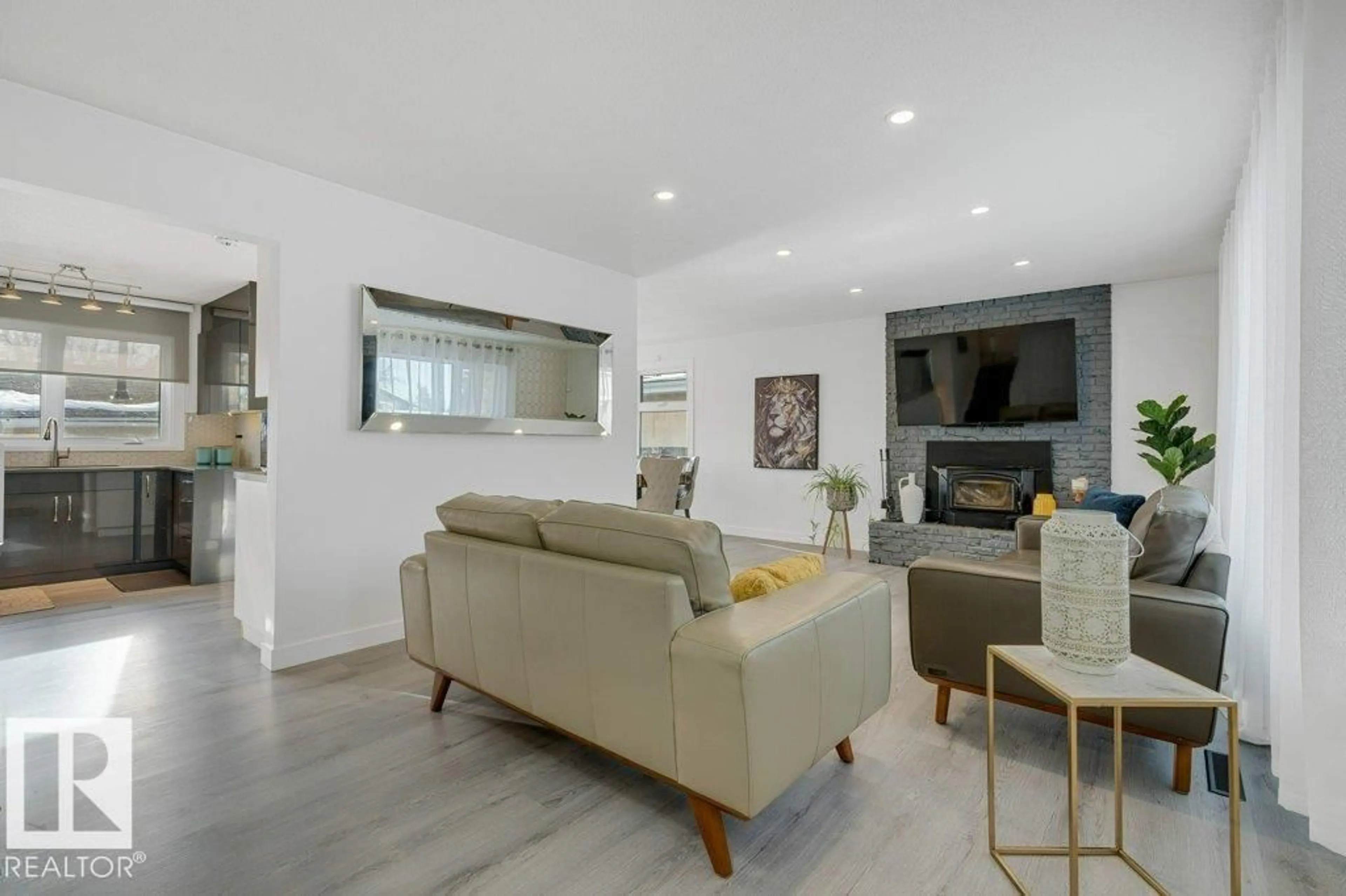 Living room with furniture, unknown for NW - 7611 141 AV, Edmonton Alberta T5C2N4