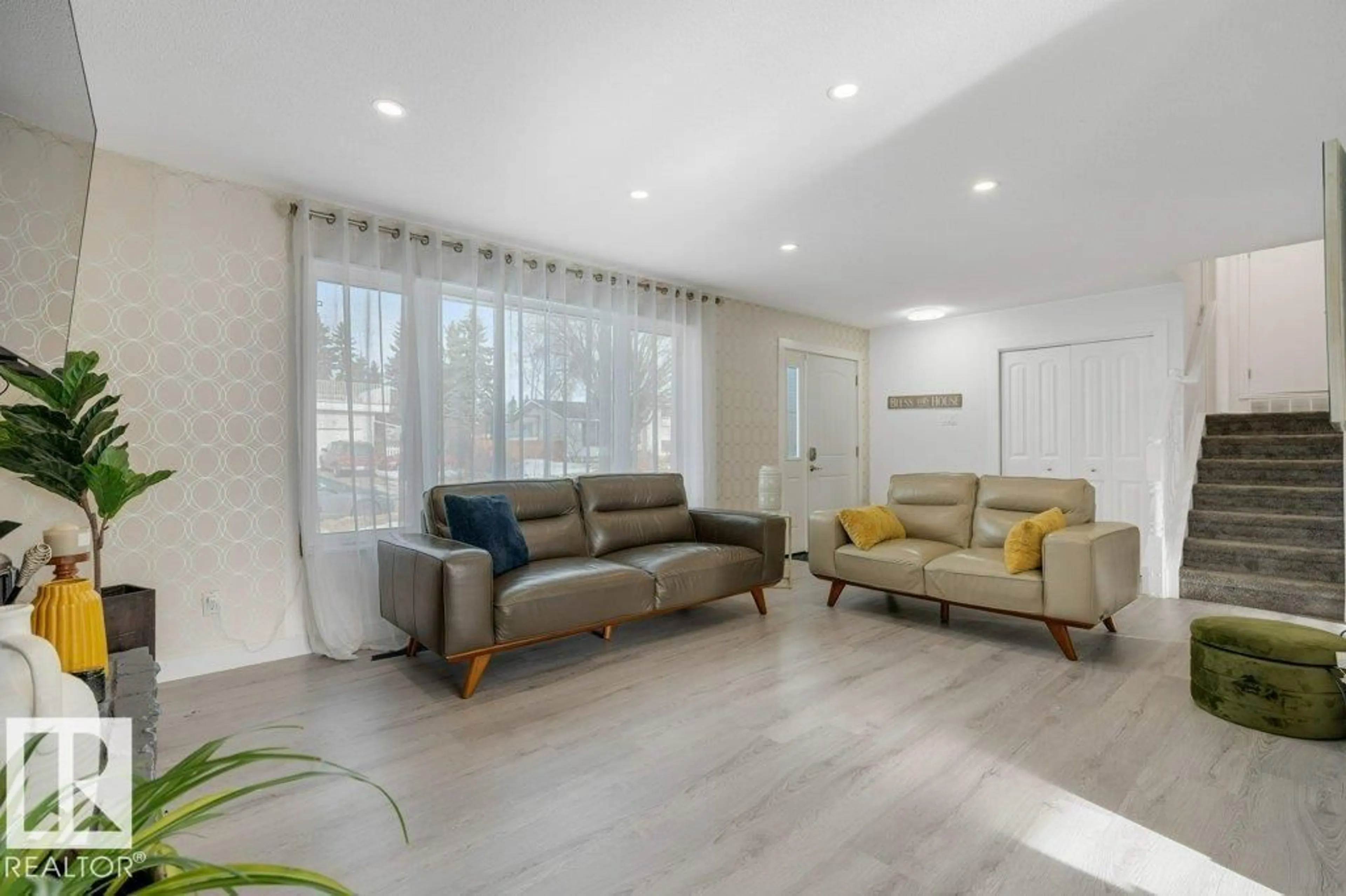 Living room with furniture, unknown for NW - 7611 141 AV, Edmonton Alberta T5C2N4