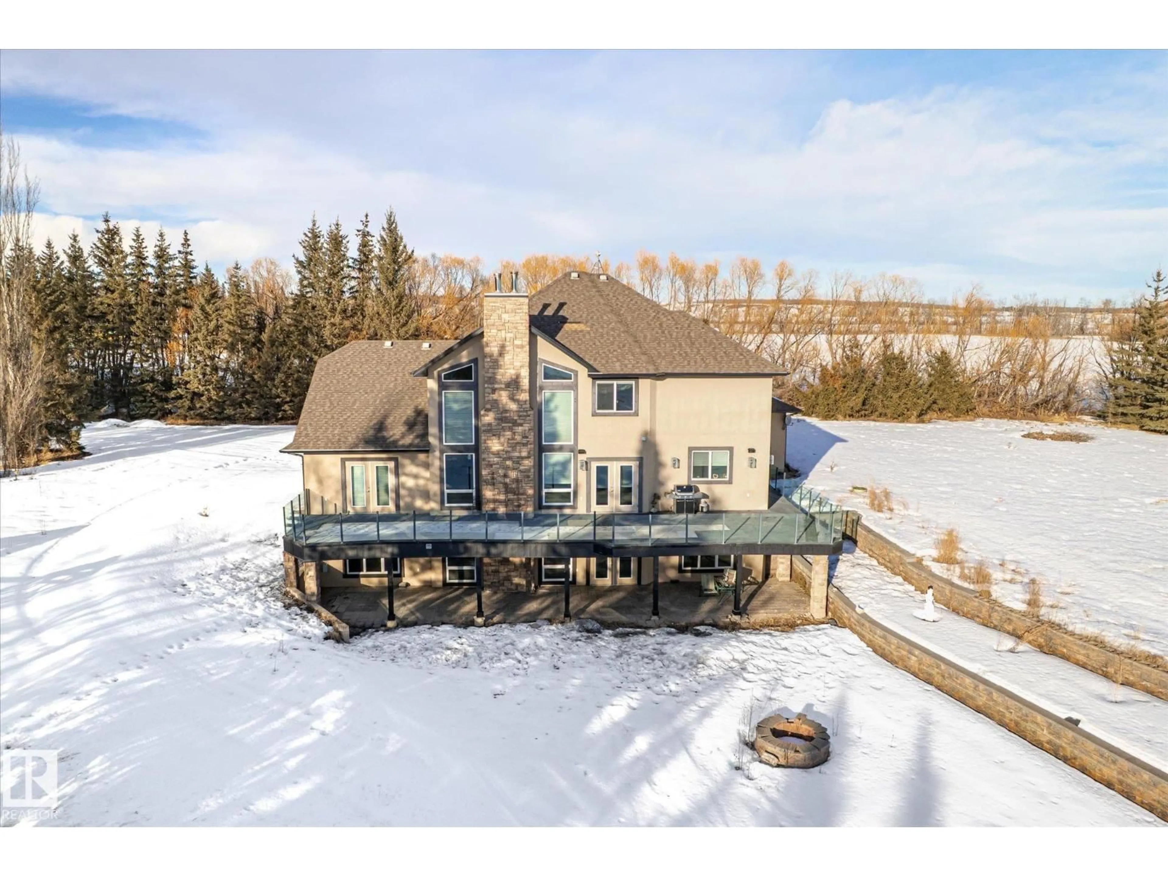 A pic from outside/outdoor area/front of a property/back of a property/a pic from drone, mountain view for HI - 27510 HWY 37, Rural Sturgeon County Alberta T8R0J2