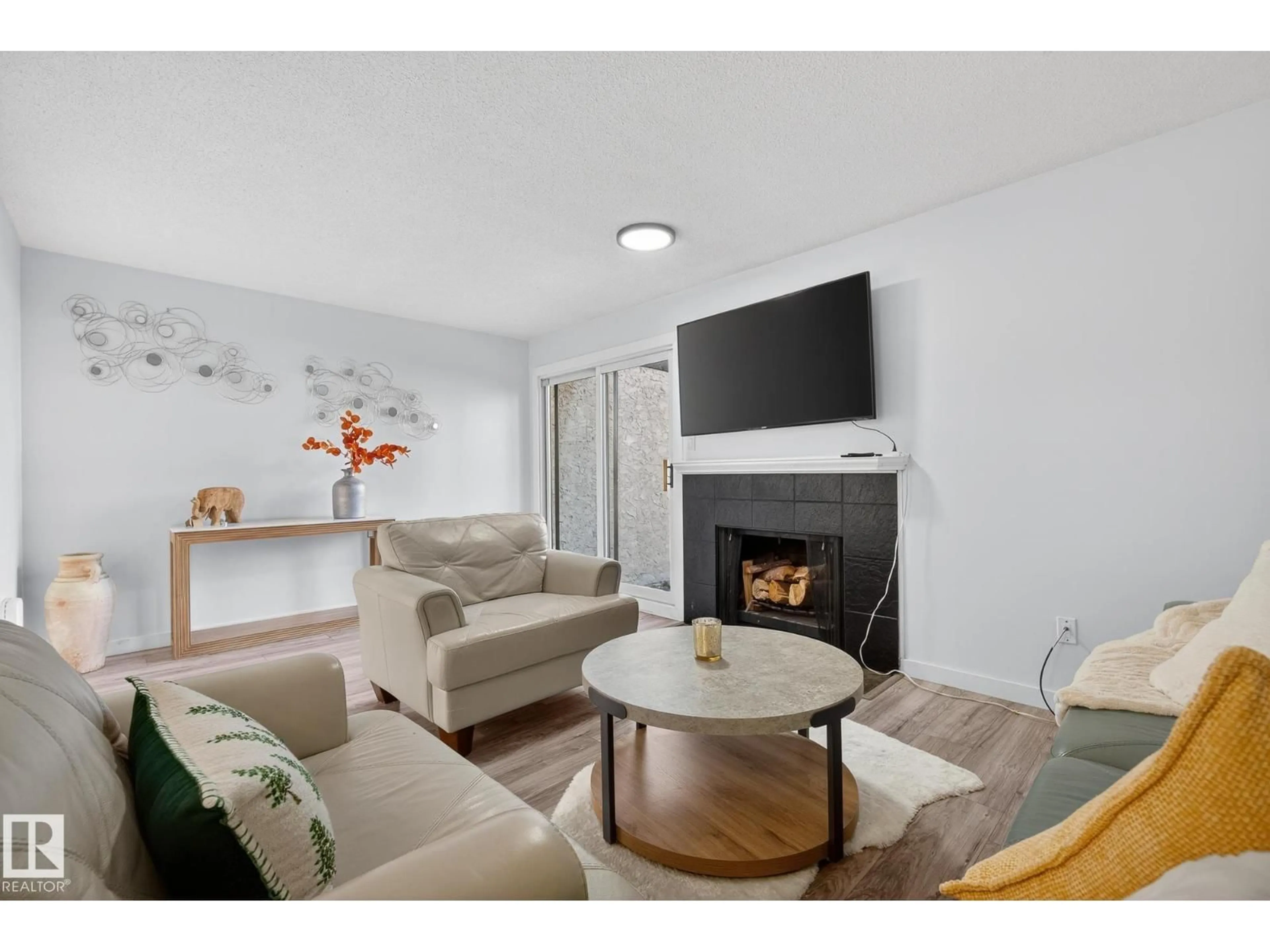 Living room with furniture, unknown for NW - 12022 25 AV, Edmonton Alberta T6J4L3