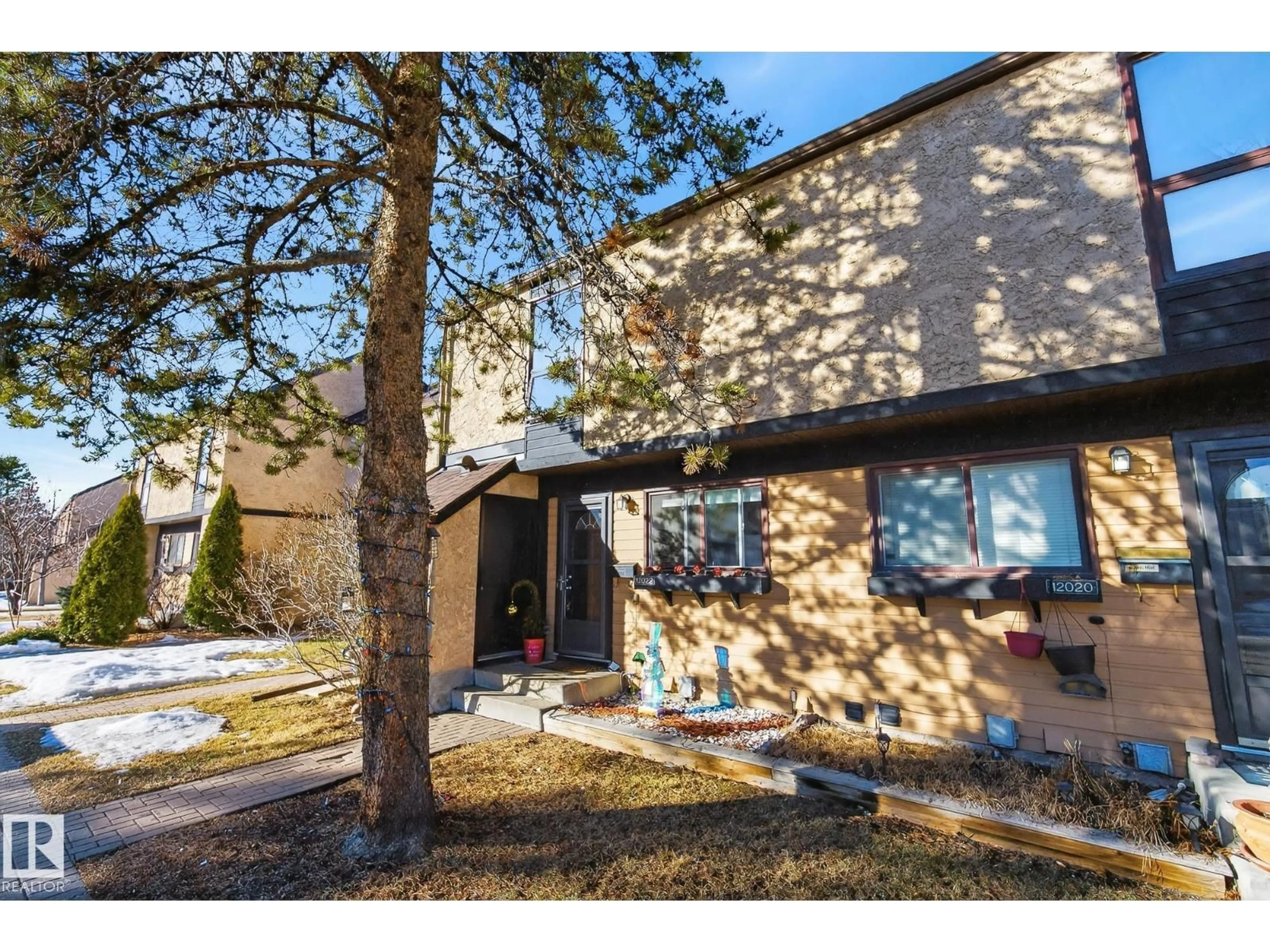 Home with brick exterior material, street for NW - 12022 25 AV, Edmonton Alberta T6J4L3