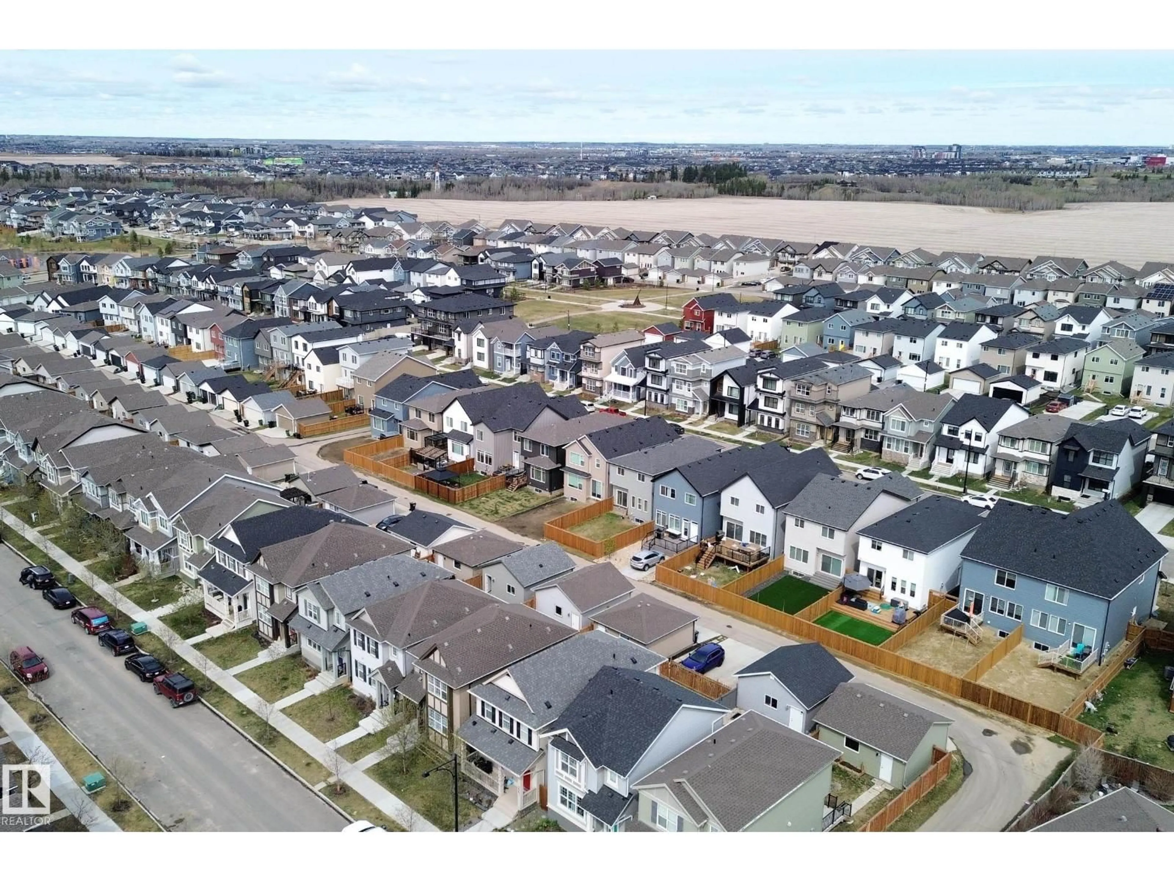 A pic from outside/outdoor area/front of a property/back of a property/a pic from drone, street for GR SW - 2894 COUGHLAN GREEN, Edmonton Alberta T6W4B2