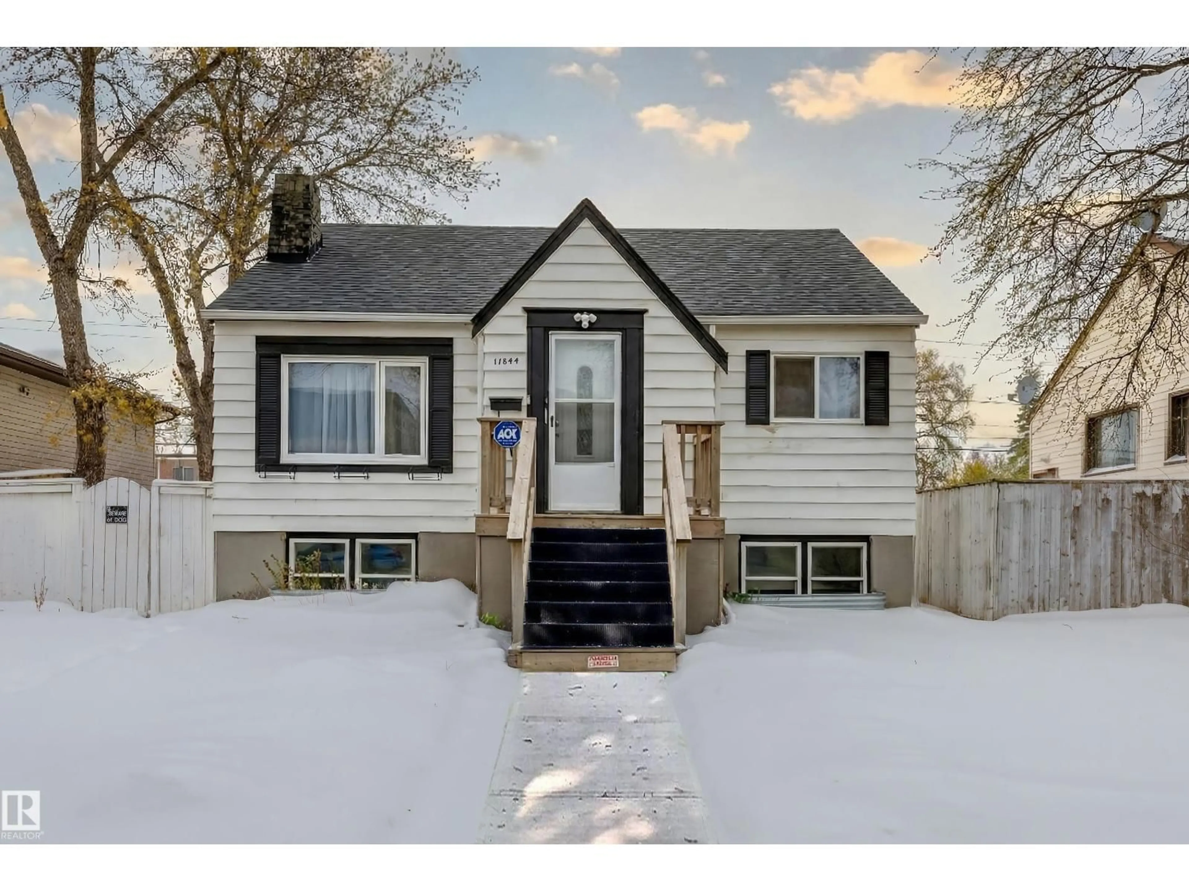 Home with vinyl exterior material, street for NW - 11844 96 ST, Edmonton Alberta T5G1V3