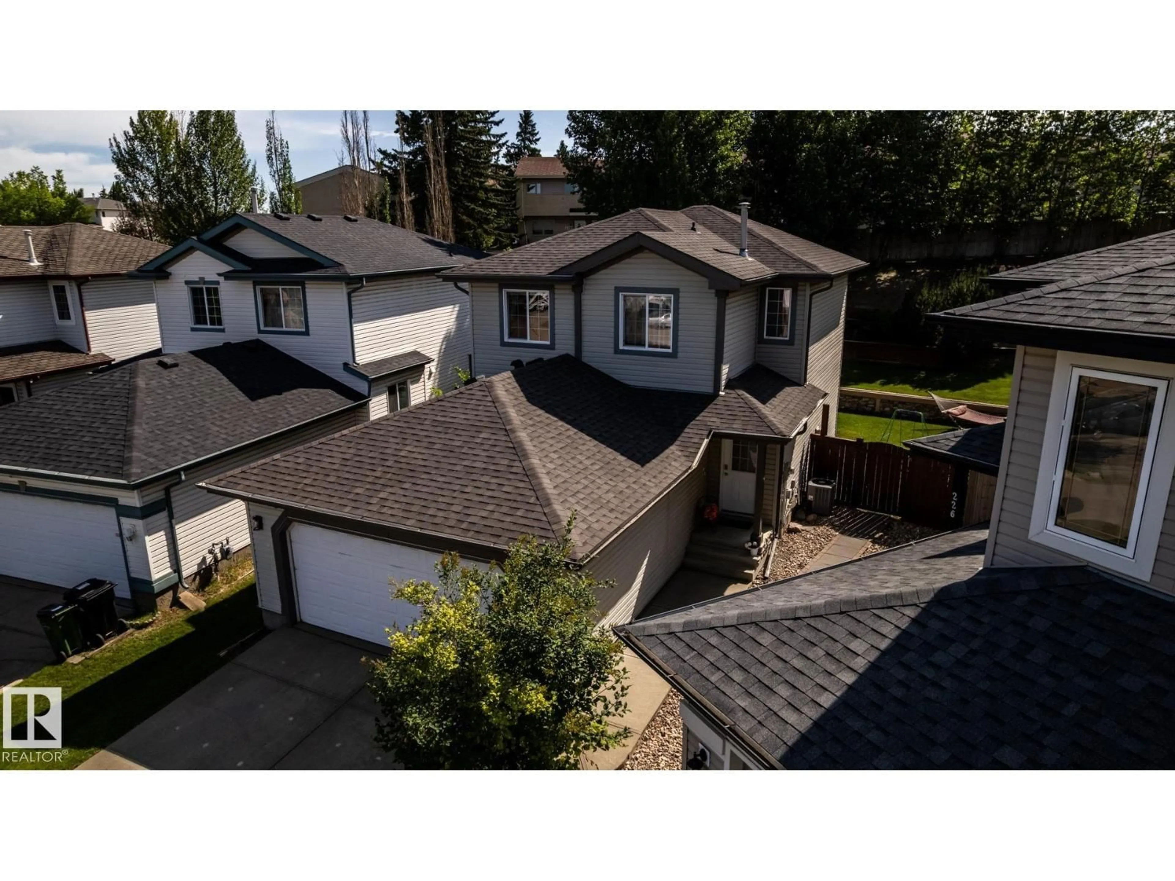 A pic from outside/outdoor area/front of a property/back of a property/a pic from drone, street for 228 HYNDMAN CR, Edmonton Alberta T5A5H9