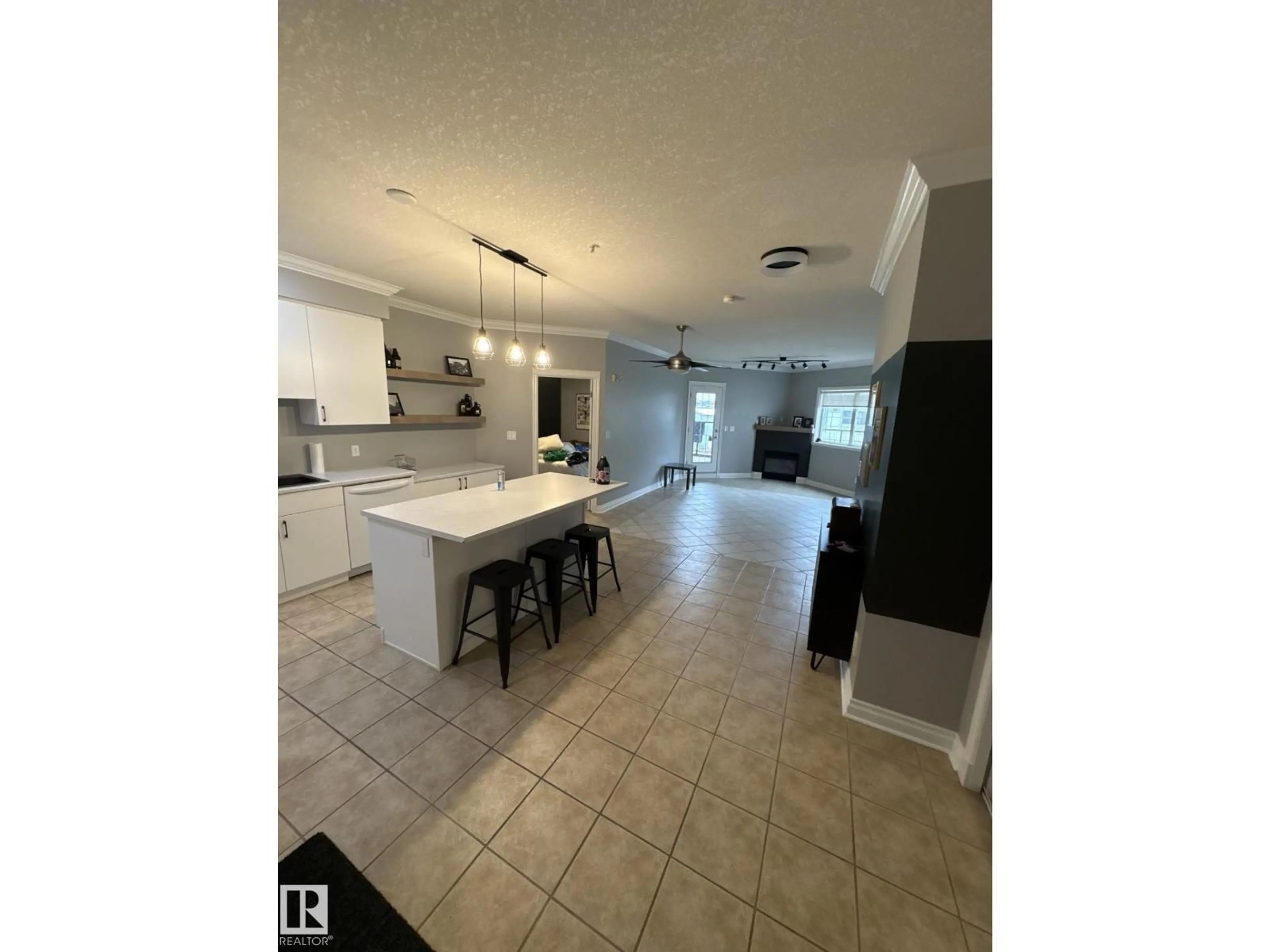 Open concept kitchen, ceramic/tile floor for 209 - 10116 80 AV, Edmonton Alberta T6E6V7