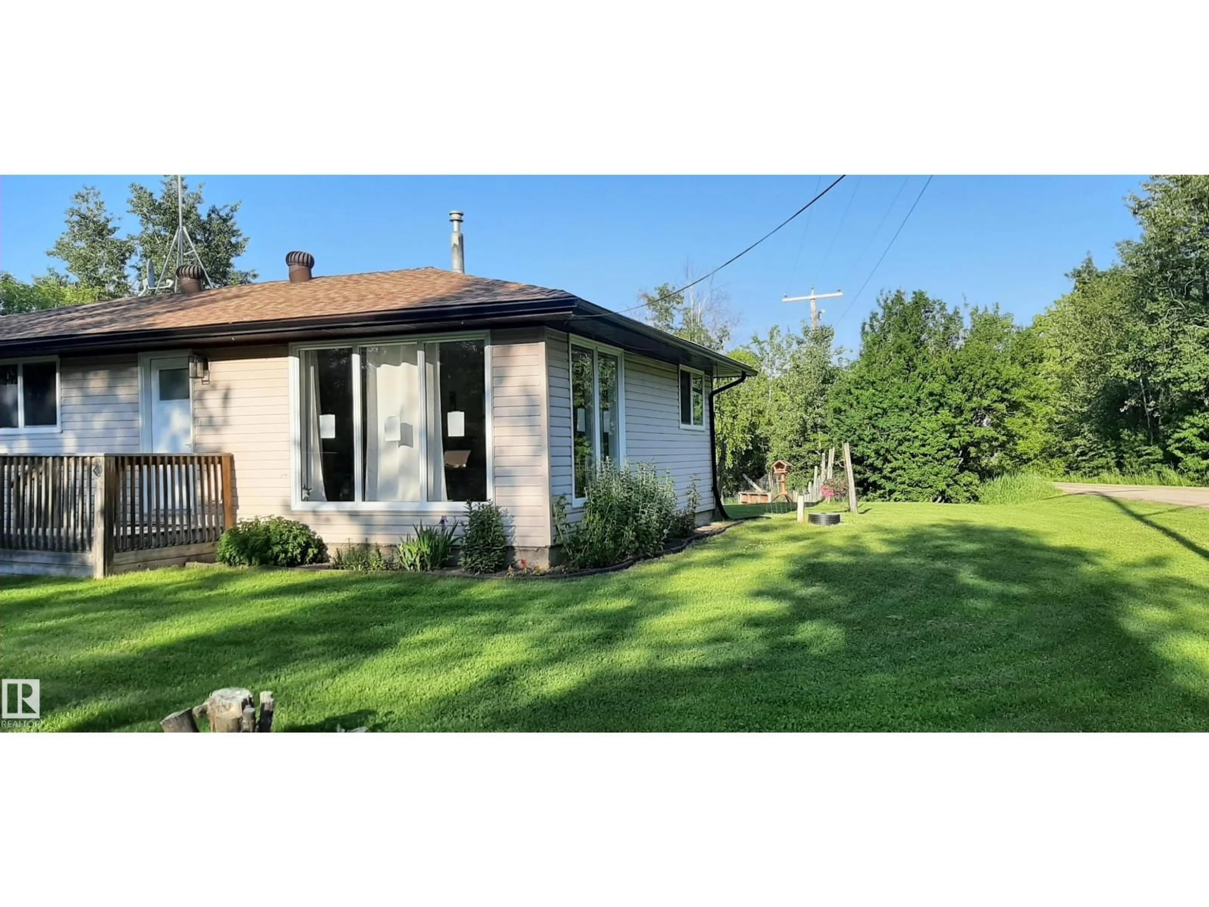 A pic from outside/outdoor area/front of a property/back of a property/a pic from drone, street for 20575 - 57 WYE RD, Rural Strathcona County Alberta T8G1H1